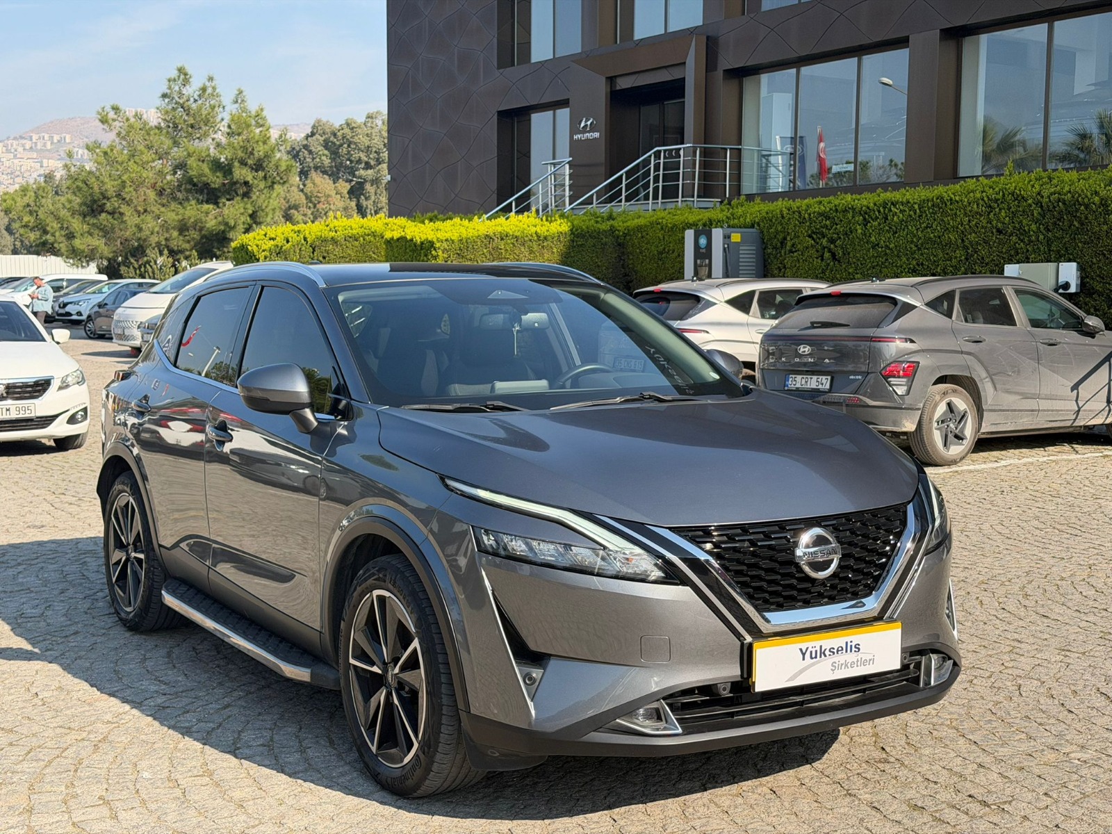 2.El Nissan Qashqai SUV 1.3 DIG-T 12V MHEV Sky Pack X-tronic | Otomatik & MHEV | Gri | İzmir.2el 2022 MHEV Otomatik Nissan Qashqai Gri Yükseliş Nakil Araçları Turizm Ticaret ve Sanayi Anonim Şirketi