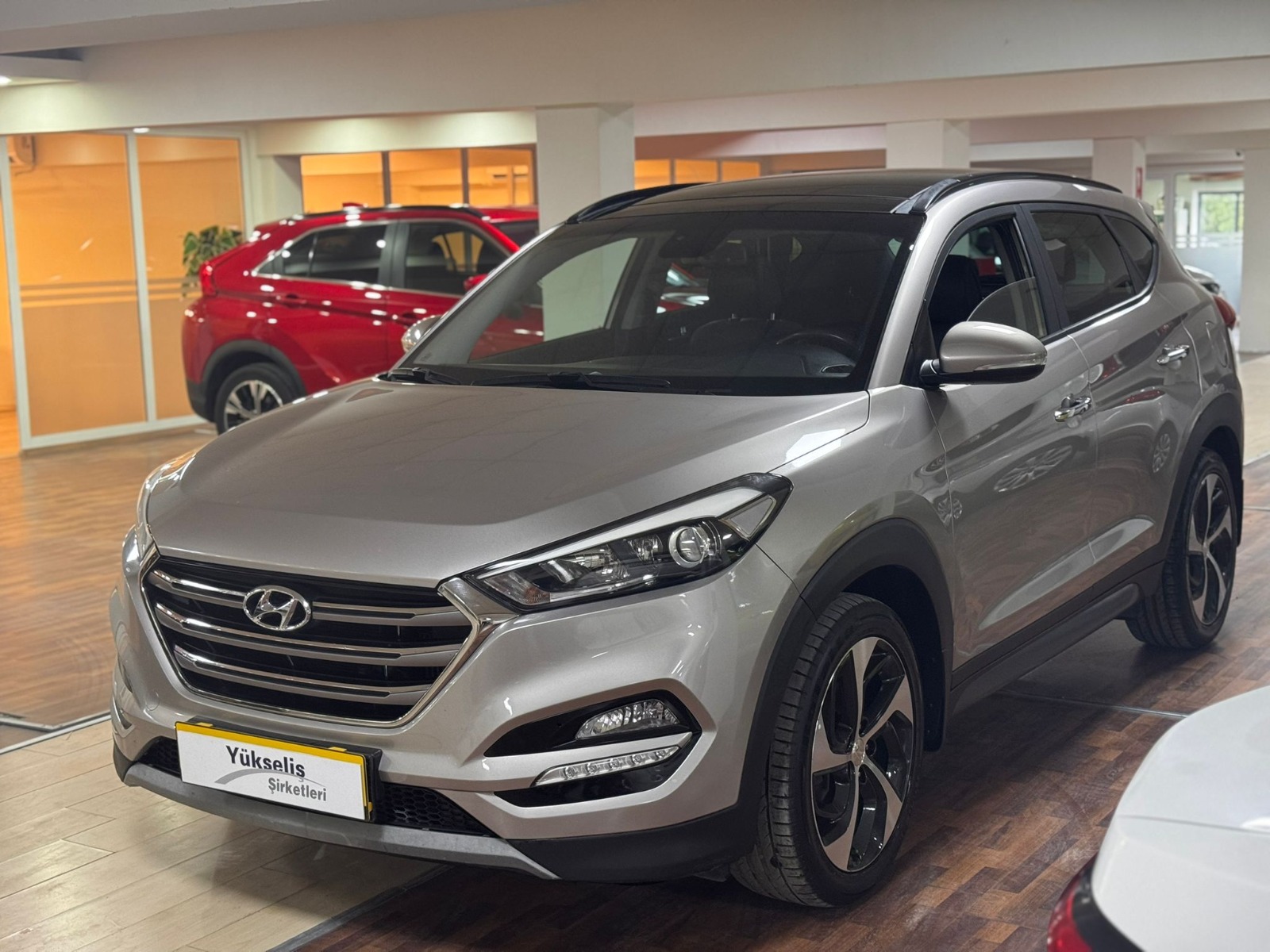 2.El Hyundai Tucson SUV 1.6 T-GDI 4x2 Elite DCT | Otomatik & Benzin | Bej | İzmir.2el 2016 Benzin Otomatik Hyundai Tucson Bej Yükseliş Nakil Araçları Turizm Ticaret ve Sanayi Anonim Şirketi
