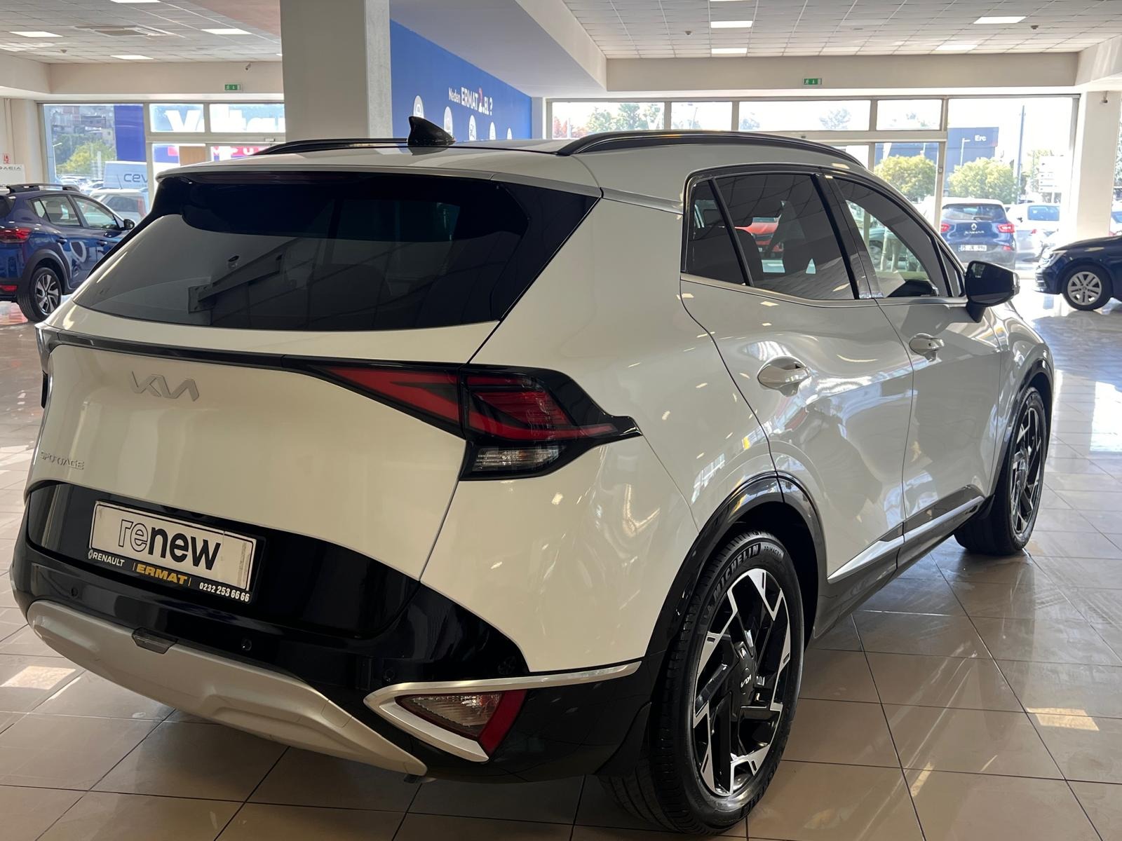 2023 MHEV Otomatik Kia Sportage Beyaz Ermat Motorlu Araçlar ve Tarım Ürünleri Sanayi Ticaret A.Ş.