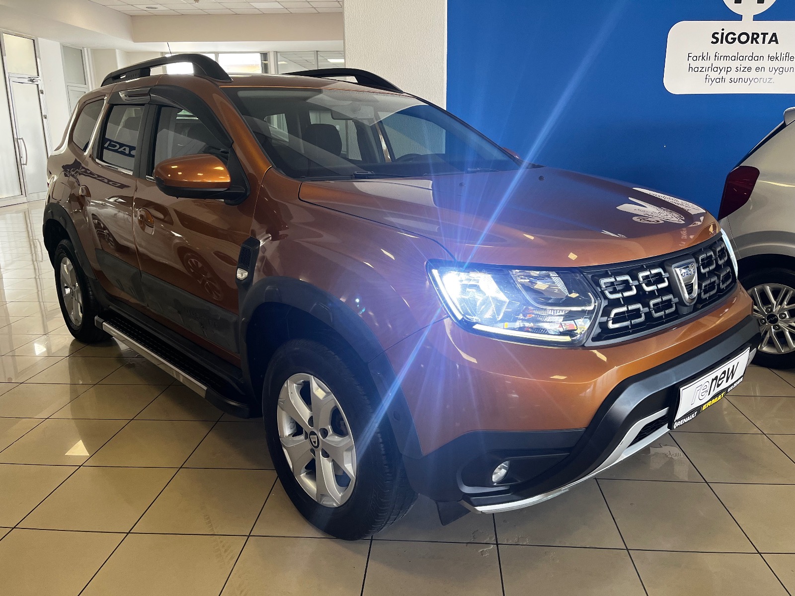 2021 Benzin + LPG Manuel Dacia Duster Turuncu Ermat Motorlu Araçlar ve Tarım Ürünleri Sanayi Ticaret A.Ş.