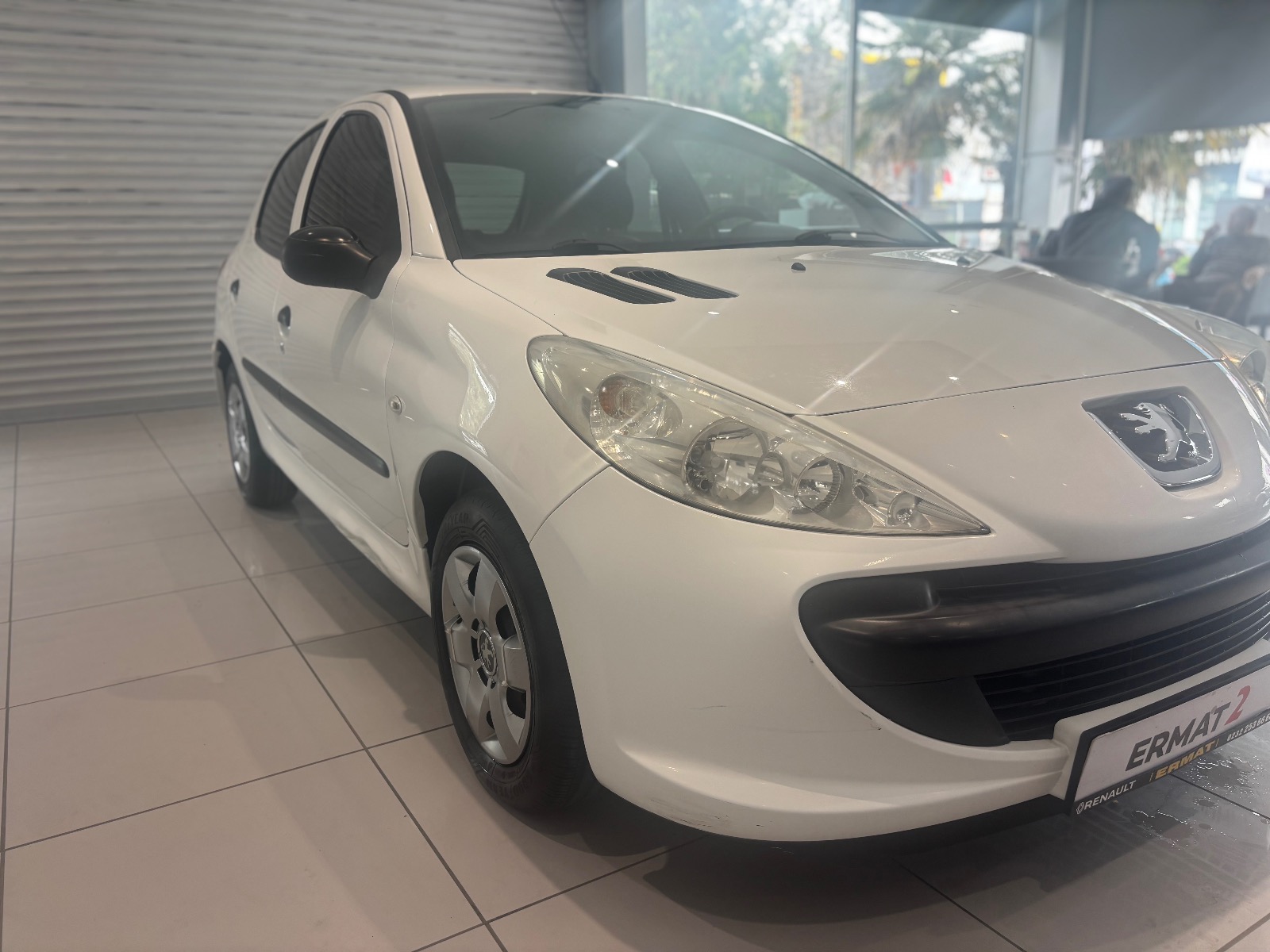 2011 Benzin Manuel Peugeot 206 + Beyaz Ermat Motorlu Araçlar ve Tarım Ürünleri Sanayi Ticaret A.Ş.