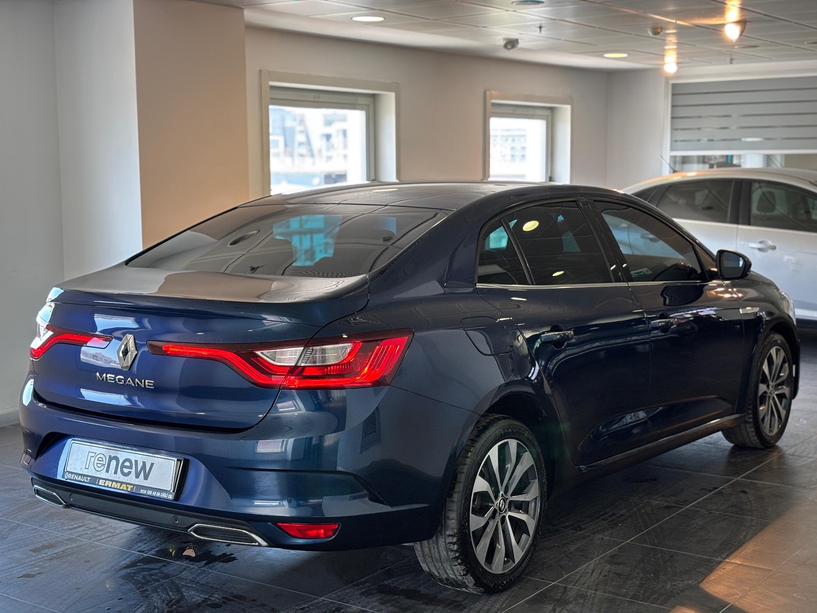 2023 Benzin Otomatik Renault Megane Lacivert Ermat Motorlu Araçlar ve Tarım Ürünleri Sanayi Ticaret A.Ş.