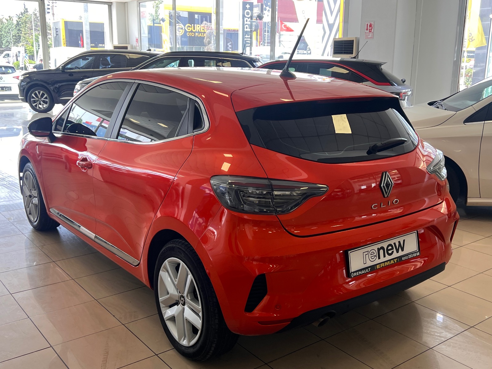 2023 Benzin Otomatik Renault Clio Turuncu Ermat Motorlu Araçlar ve Tarım Ürünleri Sanayi Ticaret A.Ş.