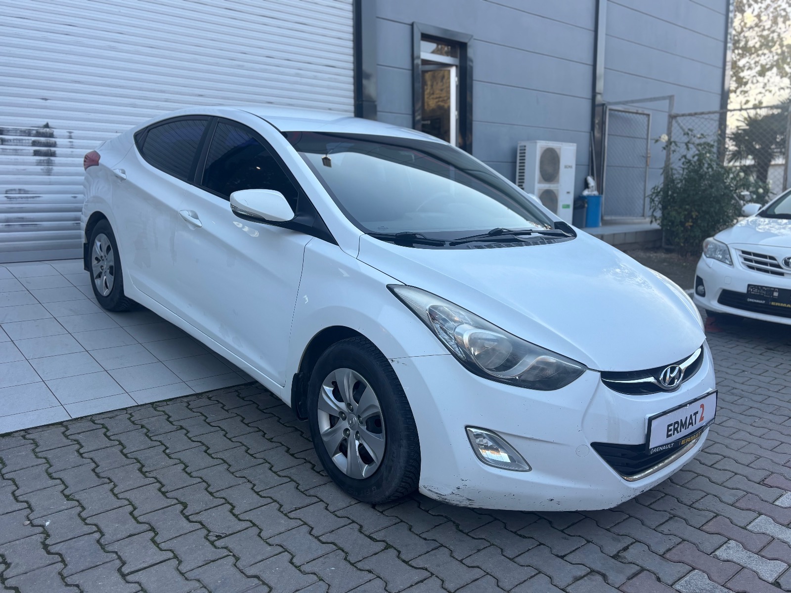 2011 Benzin + LPG Manuel Hyundai Elantra Beyaz Ermat Motorlu Araçlar ve Tarım Ürünleri Sanayi Ticaret A.Ş.