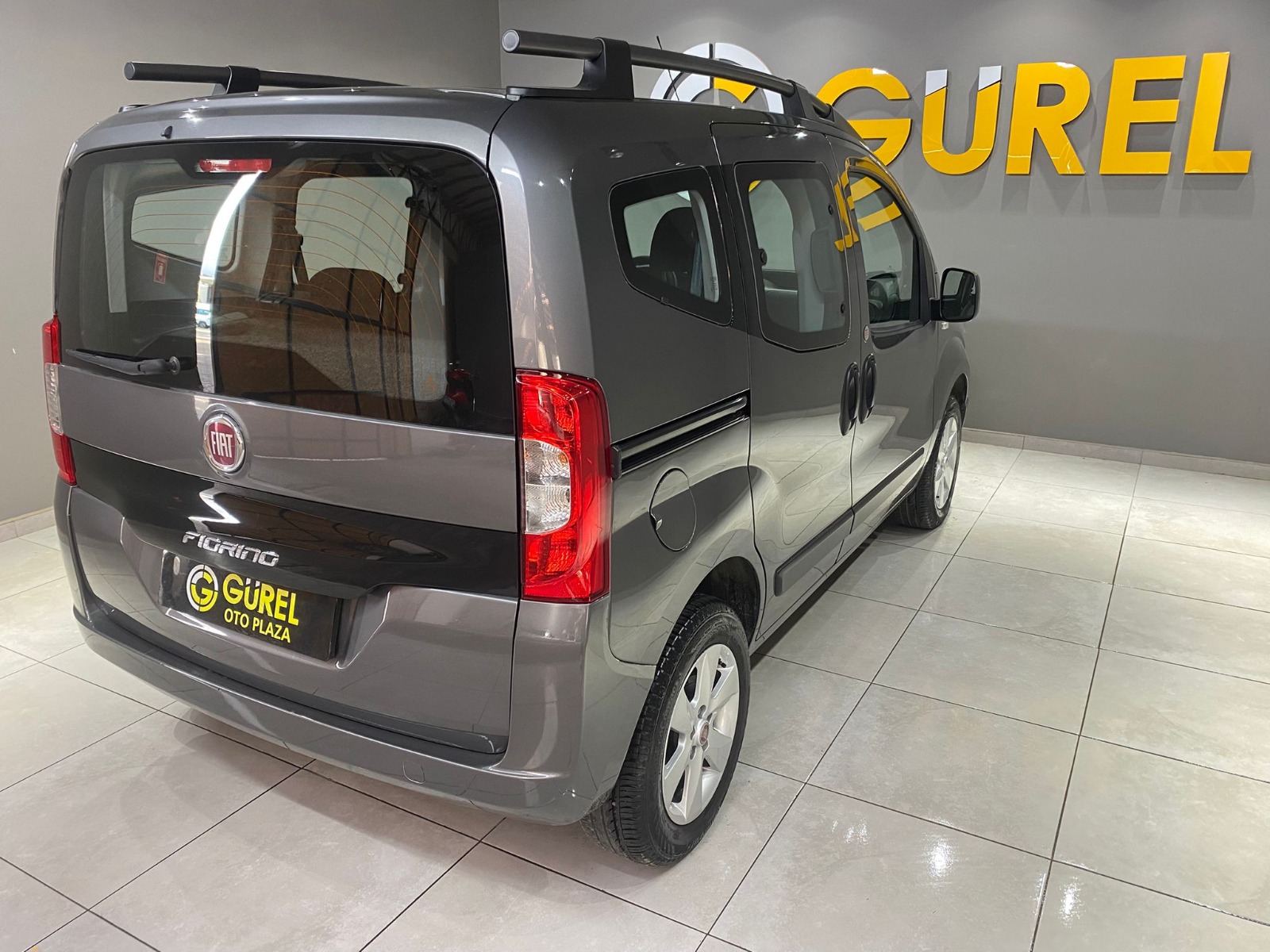 TaksitliOto.Net | 2.El Fiat Fiorino Combi 1.4 Eko Safeline | Manuel & Benzin + LPG | Gri | İzmir.2el 2023 Benzin + LPG Manuel Fiat Fiorino Gri Gürel Tasarım Aksesuar Otomotiv San. Tic. Ltd. Şti.