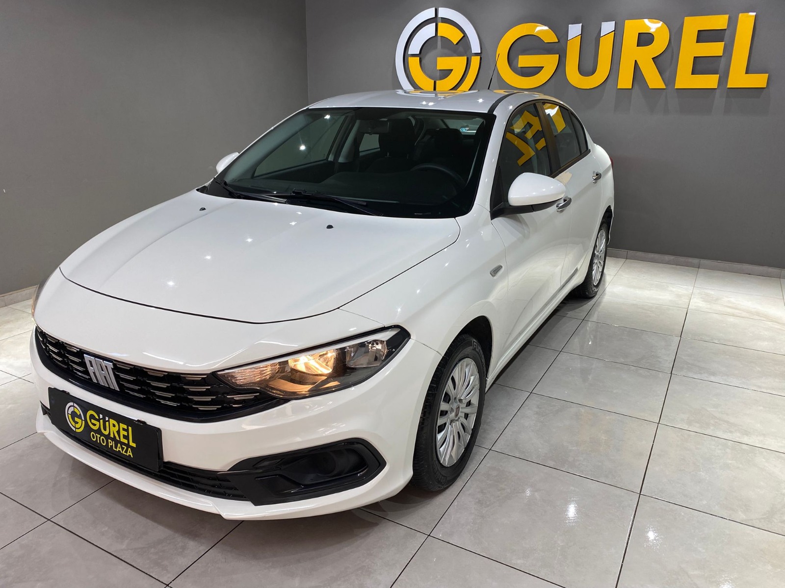 TaksitliOto.Net | 2.El Fiat Egea Sedan 1.6 MultiJet Easy DCT | Otomatik & Dizel | Beyaz | İzmir.2el 2022 Dizel Otomatik Fiat Egea Beyaz Gürel Tasarım Aksesuar Otomotiv San. Tic. Ltd. Şti.