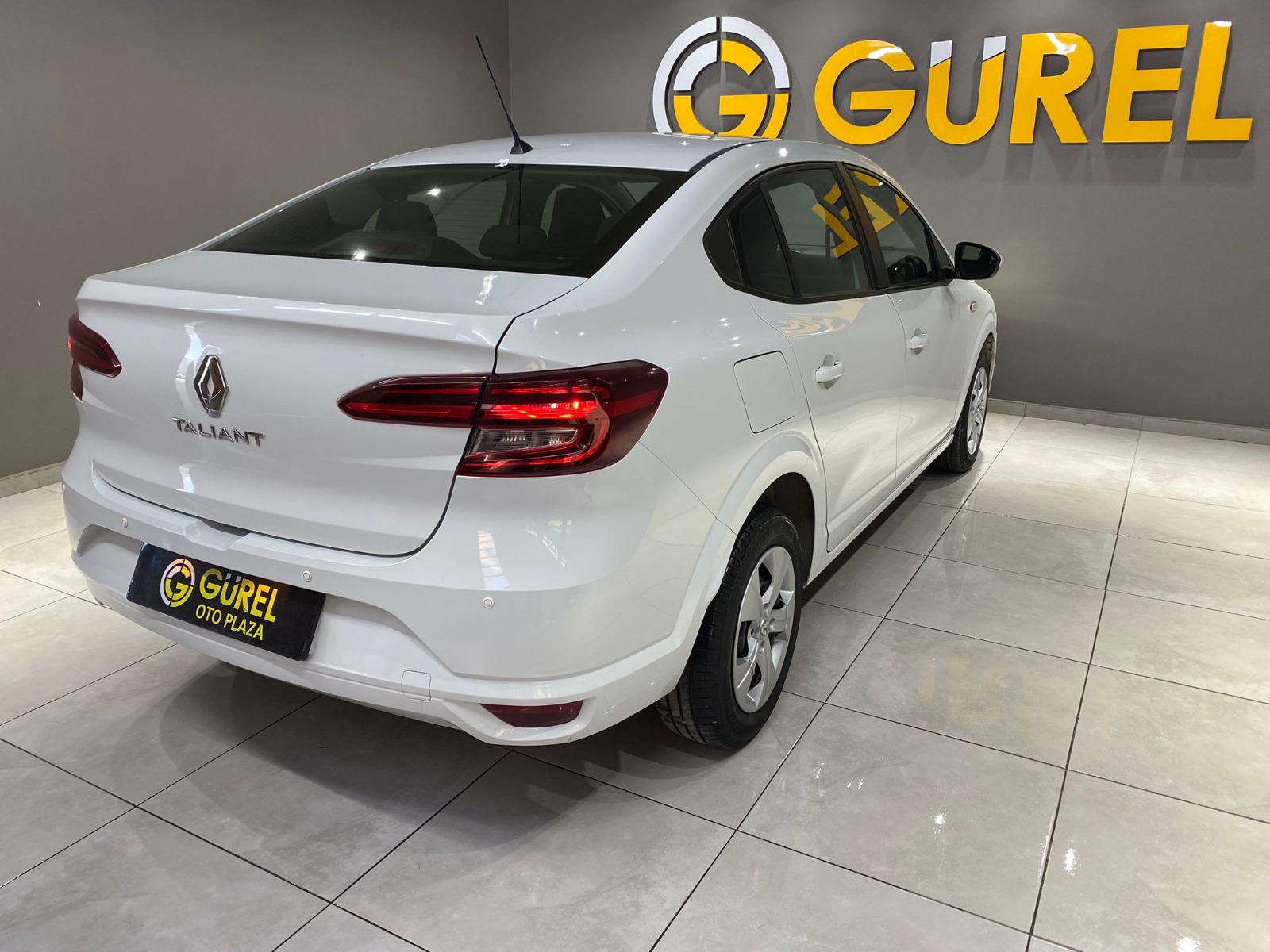 TaksitliOto.Net | 2.El Renault Taliant Sedan 1.0 SCE Joy | Manuel & Benzin | Beyaz | İzmir.2el 2022 Benzin Manuel Renault Taliant Beyaz Gürel Tasarım Aksesuar Otomotiv San. Tic. Ltd. Şti.