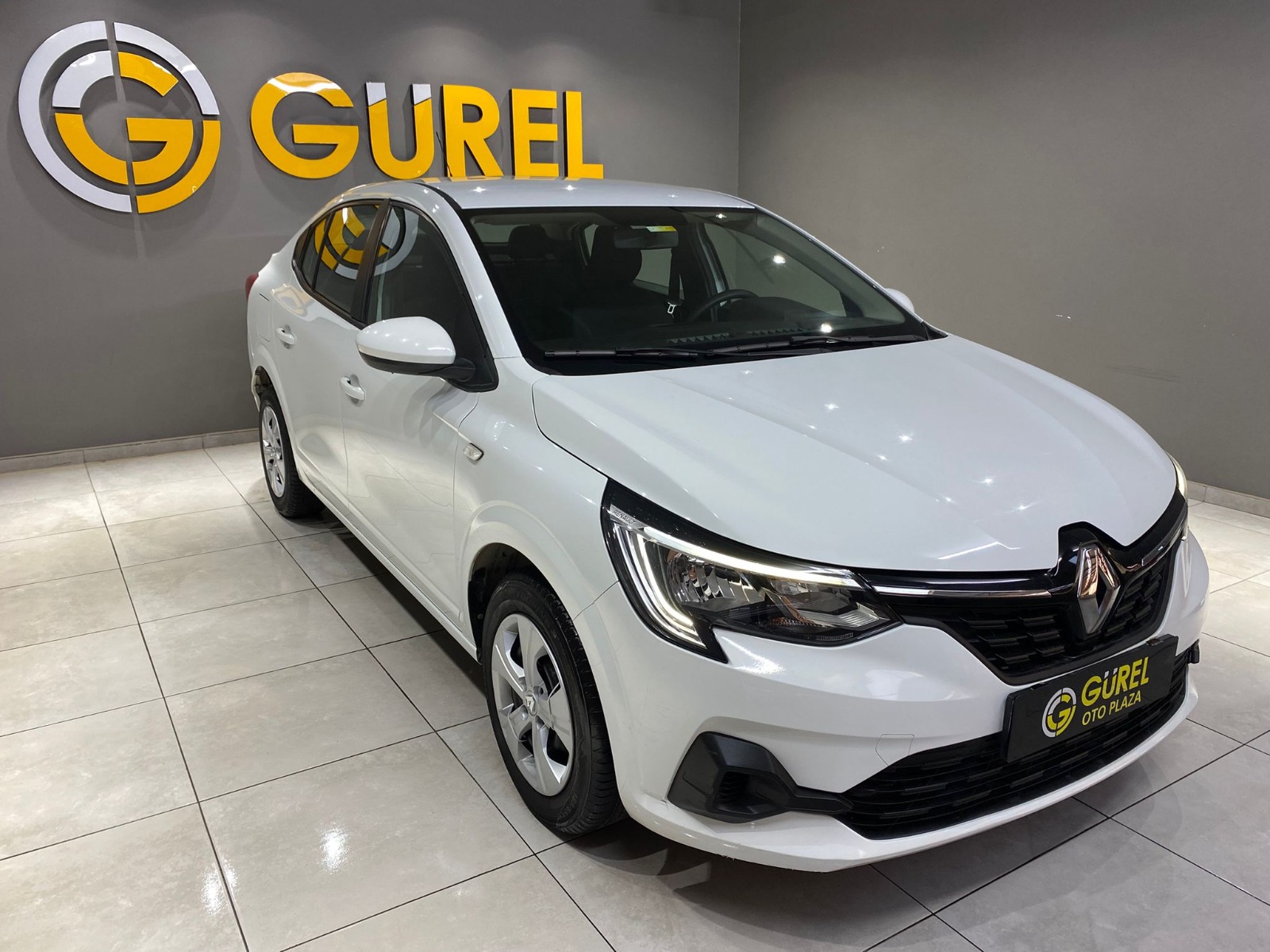 TaksitliOto.Net | 2.El Renault Taliant Sedan 1.0 SCE Joy | Manuel & Benzin | Beyaz | İzmir.2el 2022 Benzin Manuel Renault Taliant Beyaz Gürel Tasarım Aksesuar Otomotiv San. Tic. Ltd. Şti.