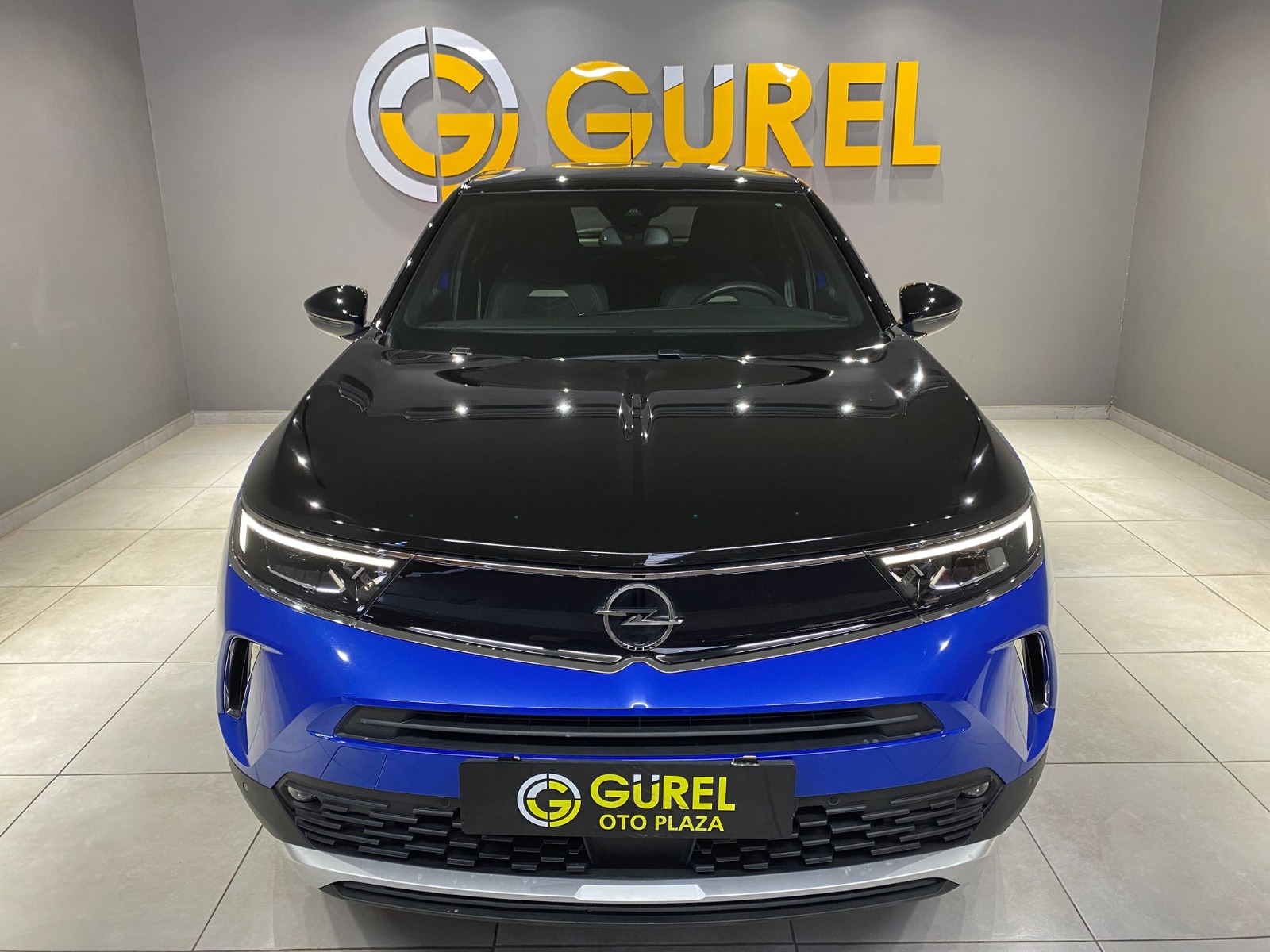 TaksitliOto.Net | 2.El Opel Mokka SUV 1.2 Turbo Ultimate Otomatik | Otomatik & Benzin | Mavi | İzmir.2el 2023 Benzin Otomatik Opel Mokka Mavi Gürel Tasarım Aksesuar Otomotiv San. Tic. Ltd. Şti.