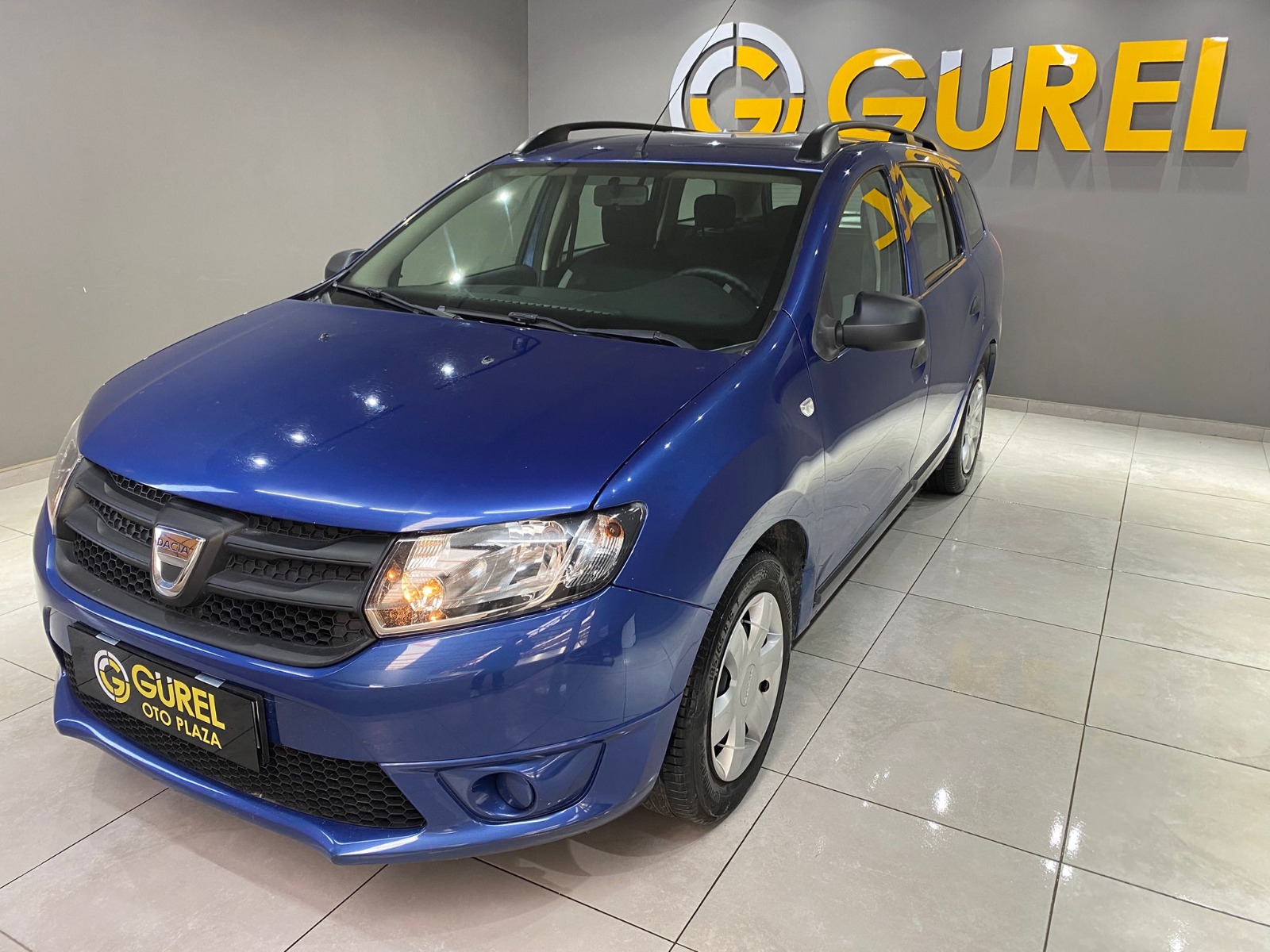 TaksitliOto.Net | 2.El Dacia Logan MCV 1.2 Ambiance | Manuel & Benzin | Mavi | İzmir.2el 2015 Benzin Manuel Dacia Logan Mavi Gürel Tasarım Aksesuar Otomotiv San. Tic. Ltd. Şti.