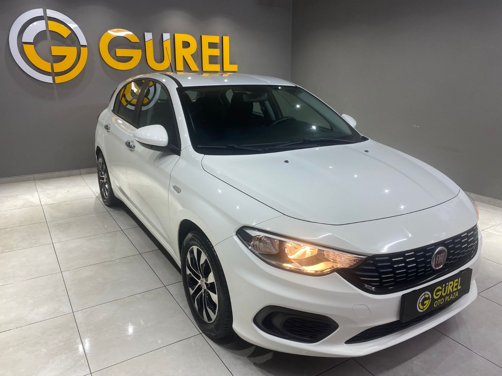 TaksitliOto.Net | 2.El Fiat Egea Hatchback 1.4 16V Fire Easy Plus | Manuel & Benzin | Beyaz | İzmir.2el 2017 Benzin Manuel Fiat Egea Beyaz Gürel Tasarım Aksesuar Otomotiv San. Tic. Ltd. Şti.