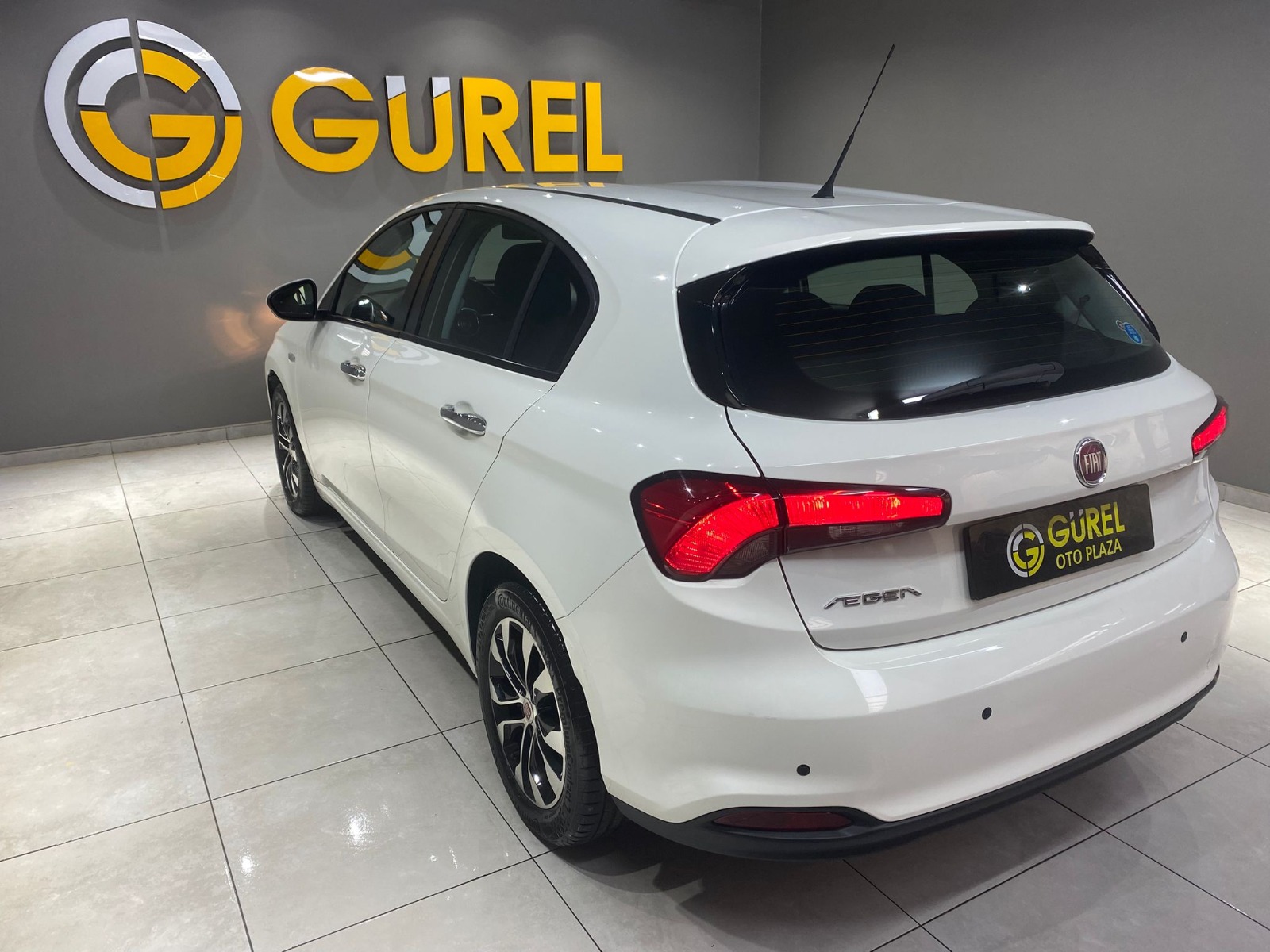 TaksitliOto.Net | 2.El Fiat Egea Hatchback 1.4 16V Fire Easy Plus | Manuel & Benzin | Beyaz | İzmir.2el 2017 Benzin Manuel Fiat Egea Beyaz Gürel Tasarım Aksesuar Otomotiv San. Tic. Ltd. Şti.