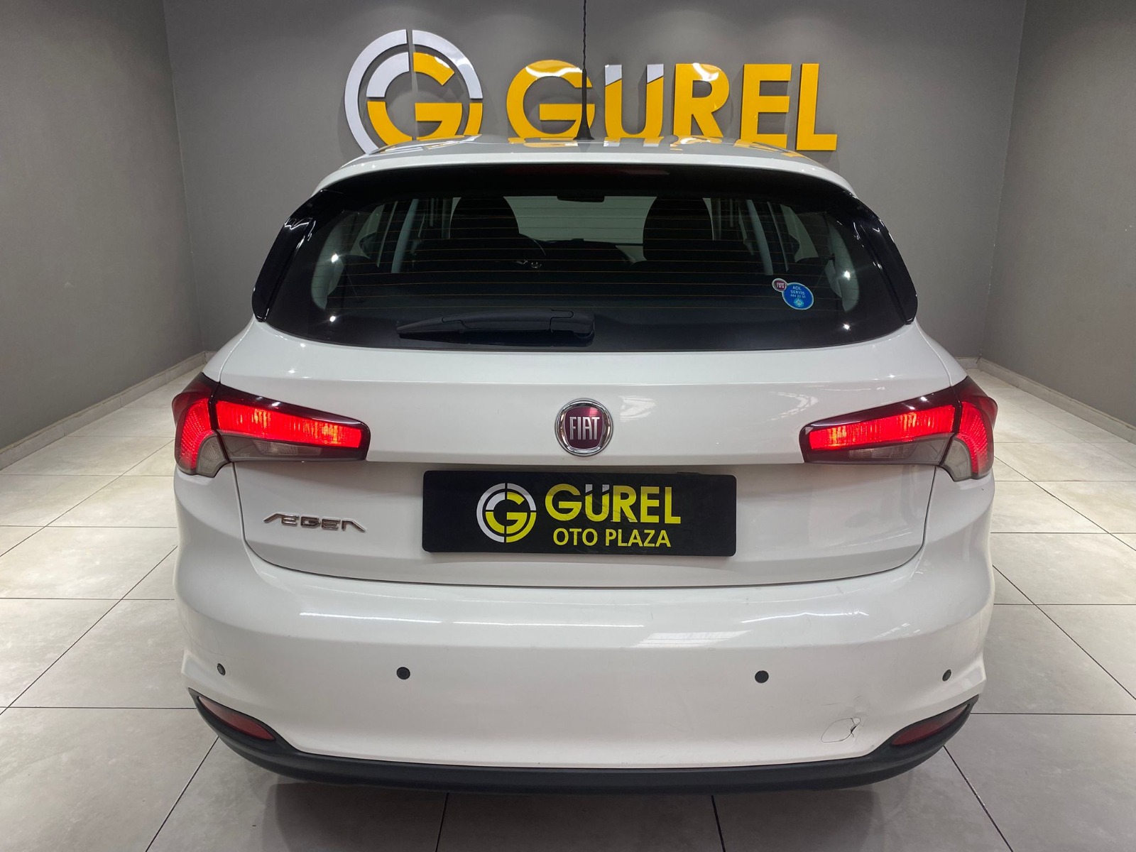 TaksitliOto.Net | 2.El Fiat Egea Hatchback 1.4 16V Fire Easy Plus | Manuel & Benzin | Beyaz | İzmir.2el 2017 Benzin Manuel Fiat Egea Beyaz Gürel Tasarım Aksesuar Otomotiv San. Tic. Ltd. Şti.