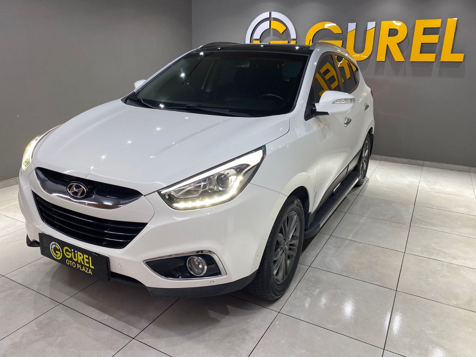 TaksitliOto.Net | 2.El Hyundai ix35 SUV 1.6 GDI 4x2 Elite | Manuel & Benzin | Beyaz | İzmir.2el 2014 Benzin Manuel Hyundai ix35 Beyaz Gürel Tasarım Aksesuar Otomotiv San. Tic. Ltd. Şti.