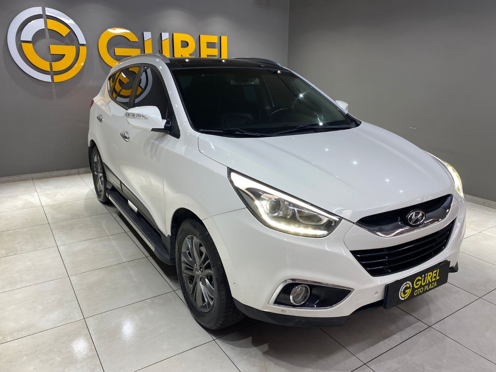 TaksitliOto.Net | 2.El Hyundai ix35 SUV 1.6 GDI 4x2 Elite | Manuel & Benzin | Beyaz | İzmir.2el 2014 Benzin Manuel Hyundai ix35 Beyaz Gürel Tasarım Aksesuar Otomotiv San. Tic. Ltd. Şti.
