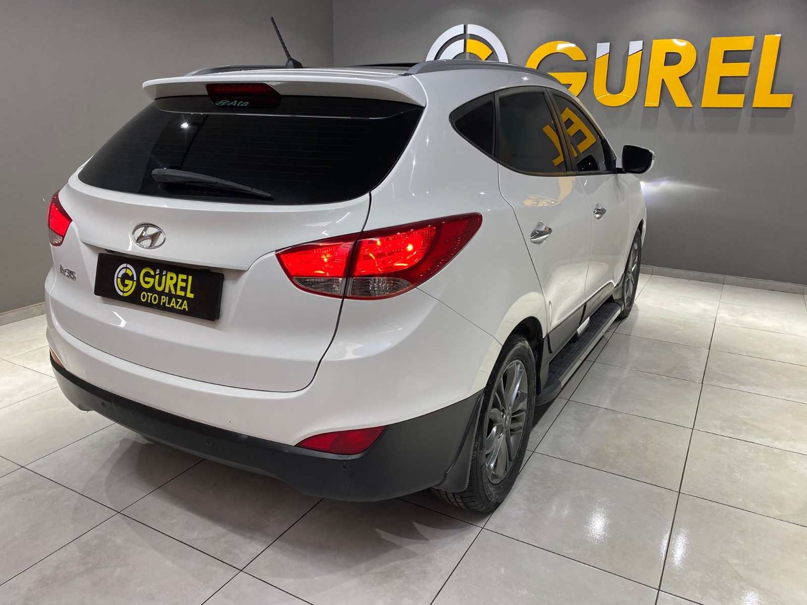 TaksitliOto.Net | 2.El Hyundai ix35 SUV 1.6 GDI 4x2 Elite | Manuel & Benzin | Beyaz | İzmir.2el 2014 Benzin Manuel Hyundai ix35 Beyaz Gürel Tasarım Aksesuar Otomotiv San. Tic. Ltd. Şti.