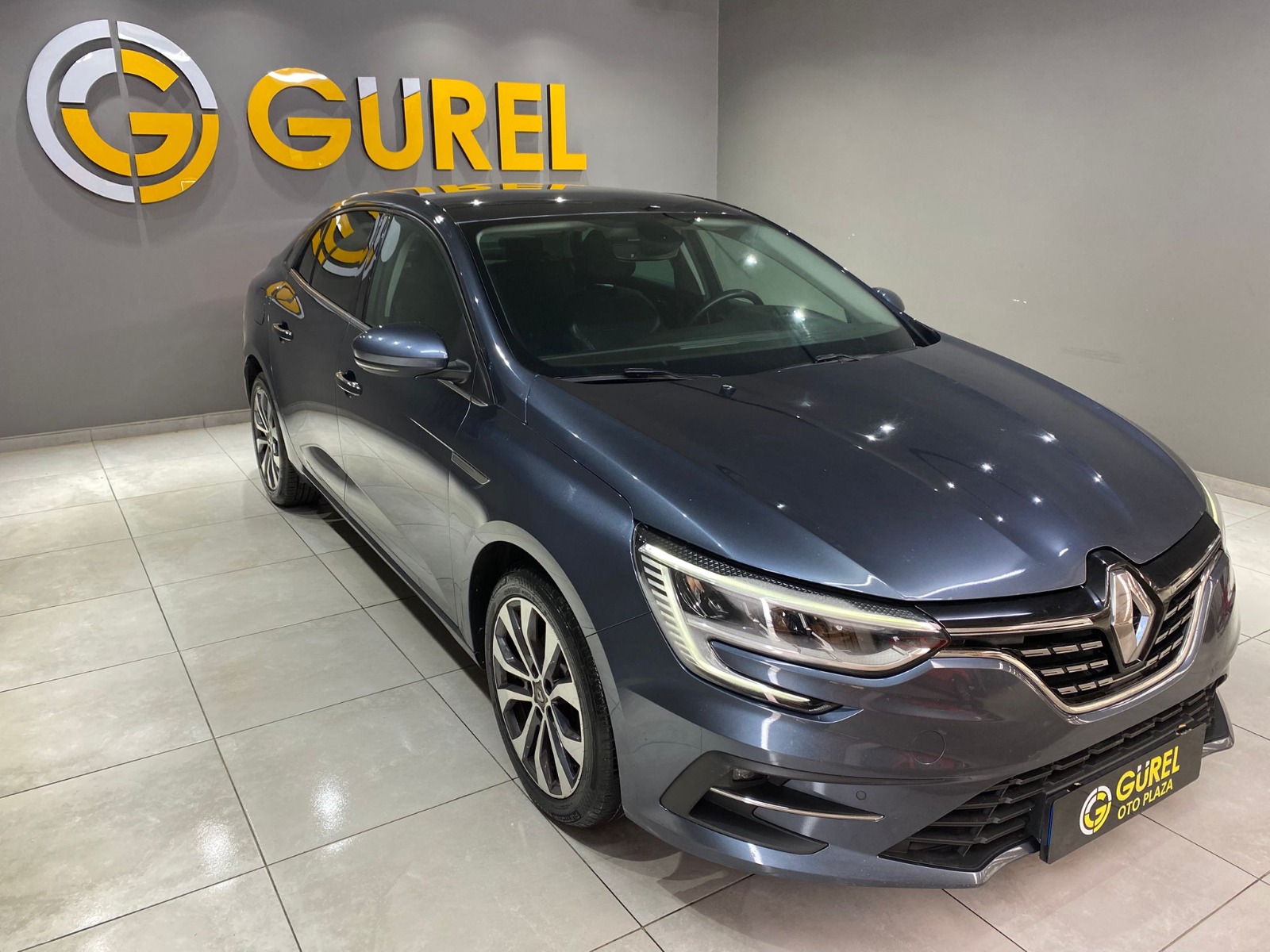 TaksitliOto.Net | 2.El Renault Megane Sedan 1.5 Blue DCI Icon EDC | Otomatik & Dizel | Gri | İzmir.2el 2022 Dizel Otomatik Renault Megane Gri Gürel Tasarım Aksesuar Otomotiv San. Tic. Ltd. Şti.