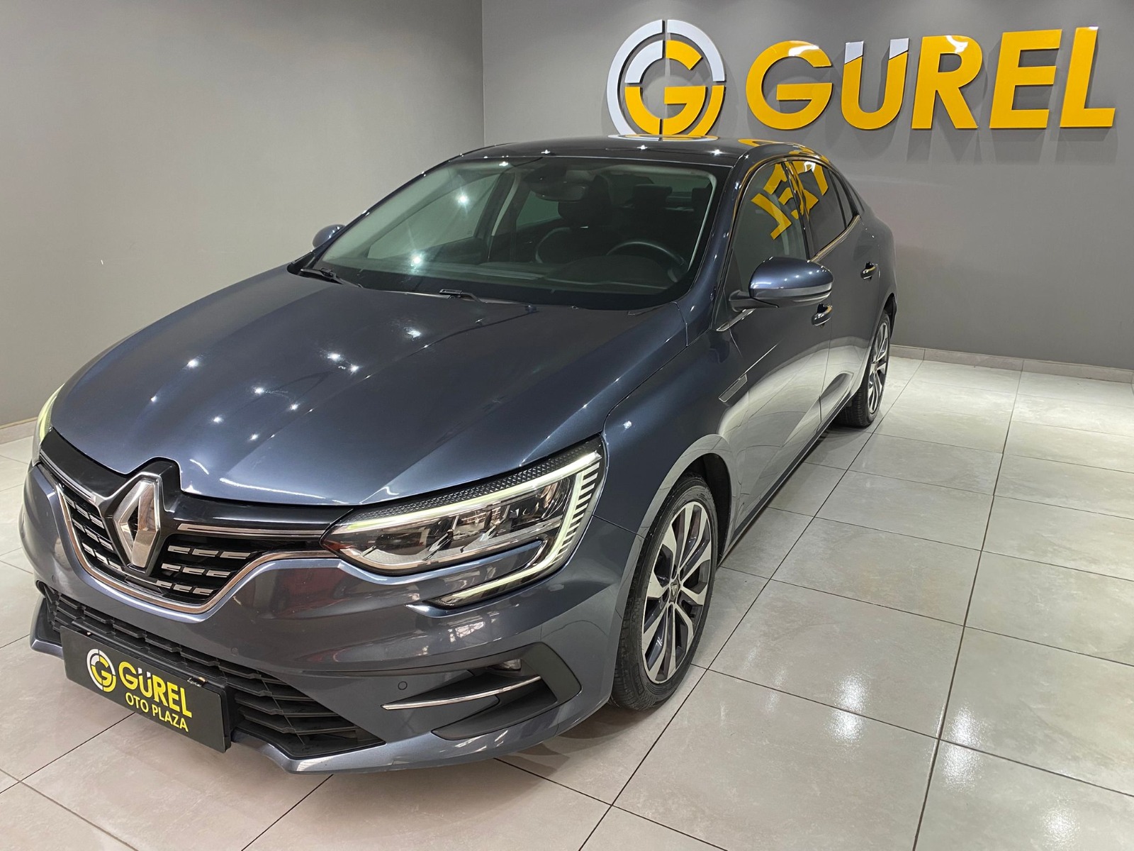 TaksitliOto.Net | 2.El Renault Megane Sedan 1.5 Blue DCI Icon EDC | Otomatik & Dizel | Gri | İzmir.2el 2022 Dizel Otomatik Renault Megane Gri Gürel Tasarım Aksesuar Otomotiv San. Tic. Ltd. Şti.