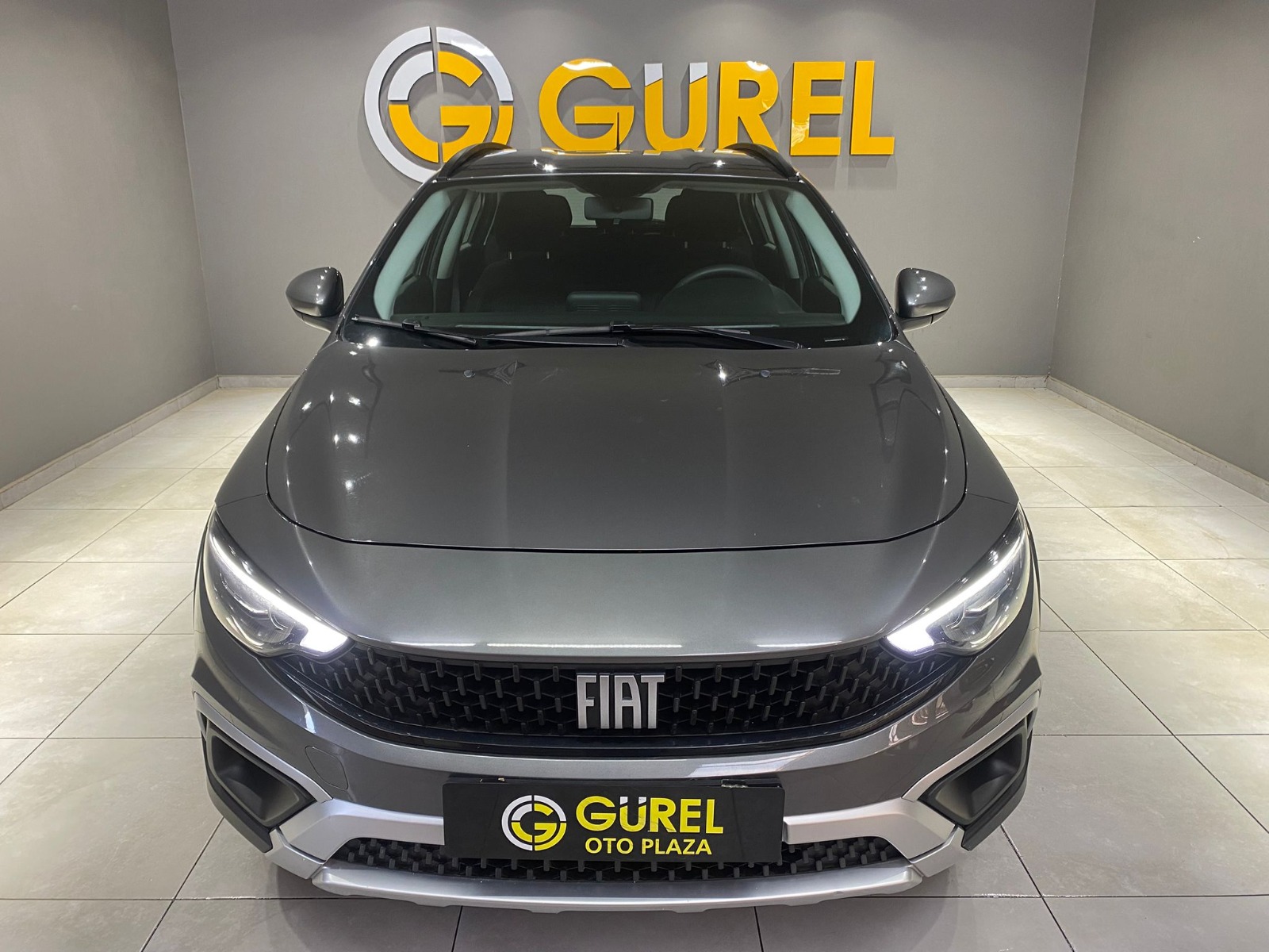TaksitliOto.Net | 2.El Fiat Egea Cross 1.4 Fire Urban | Manuel & Benzin | Gri | İzmir.2el 2023 Benzin Manuel Fiat Egea Gri Gürel Tasarım Aksesuar Otomotiv San. Tic. Ltd. Şti.