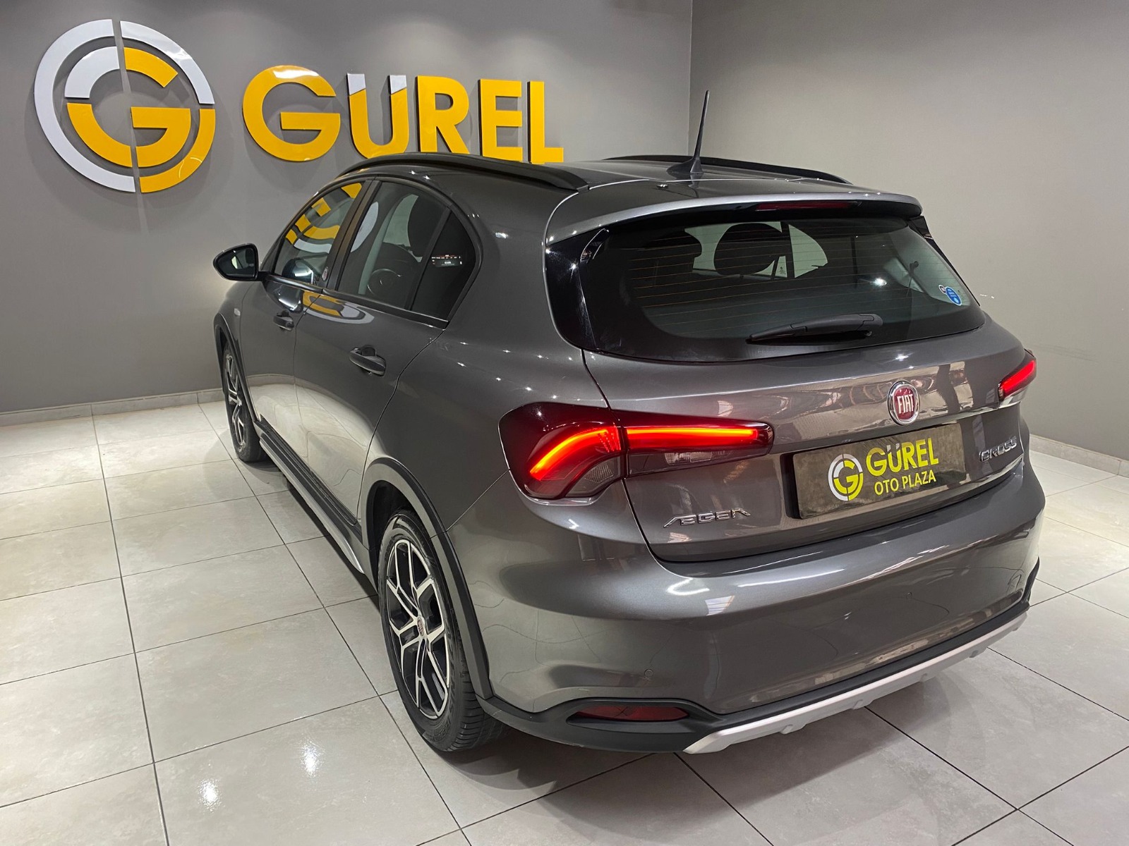 TaksitliOto.Net | 2.El Fiat Egea Cross 1.4 Fire Urban | Manuel & Benzin | Gri | İzmir.2el 2023 Benzin Manuel Fiat Egea Gri Gürel Tasarım Aksesuar Otomotiv San. Tic. Ltd. Şti.