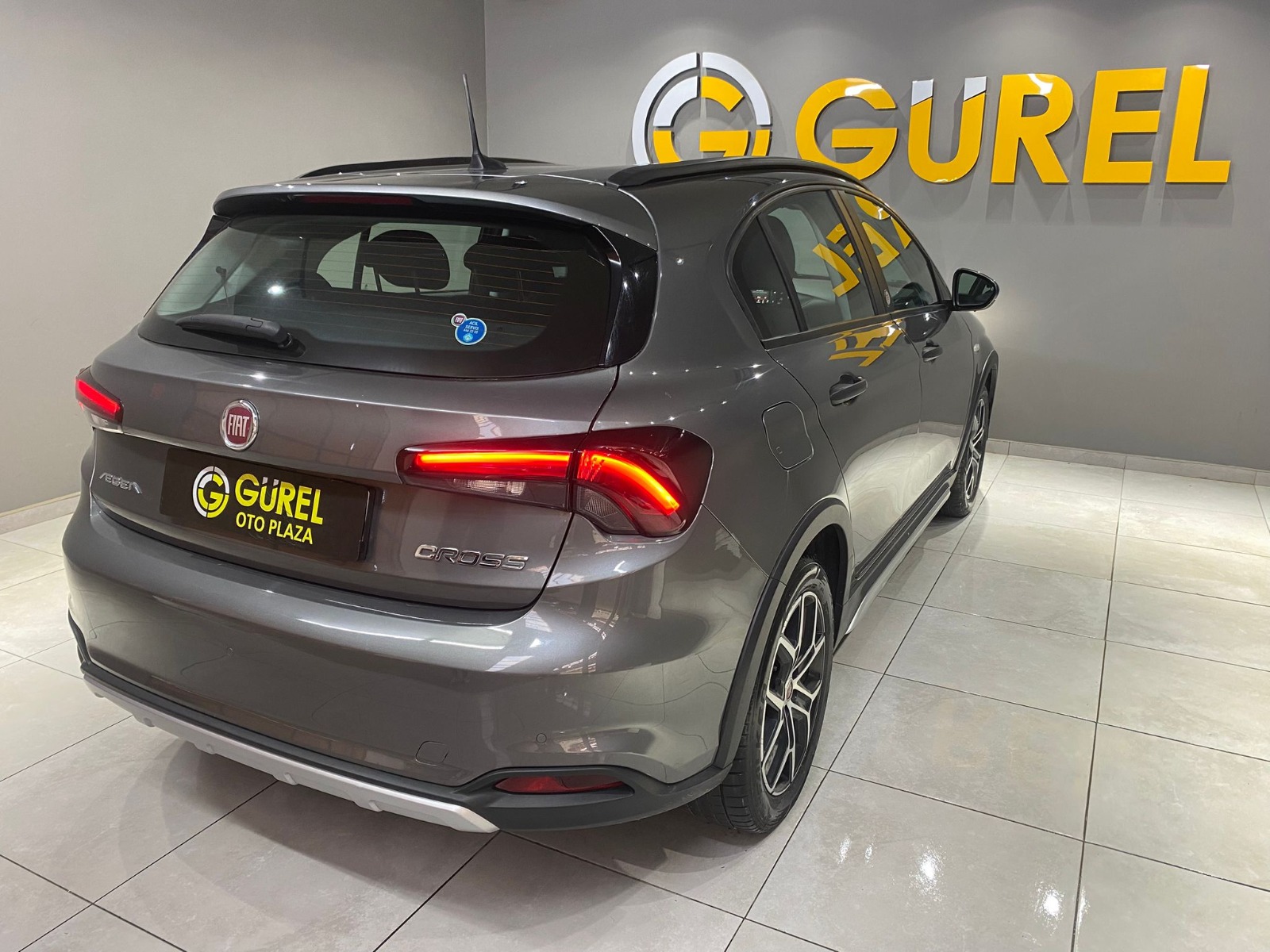 TaksitliOto.Net | 2.El Fiat Egea Cross 1.4 Fire Urban | Manuel & Benzin | Gri | İzmir.2el 2023 Benzin Manuel Fiat Egea Gri Gürel Tasarım Aksesuar Otomotiv San. Tic. Ltd. Şti.