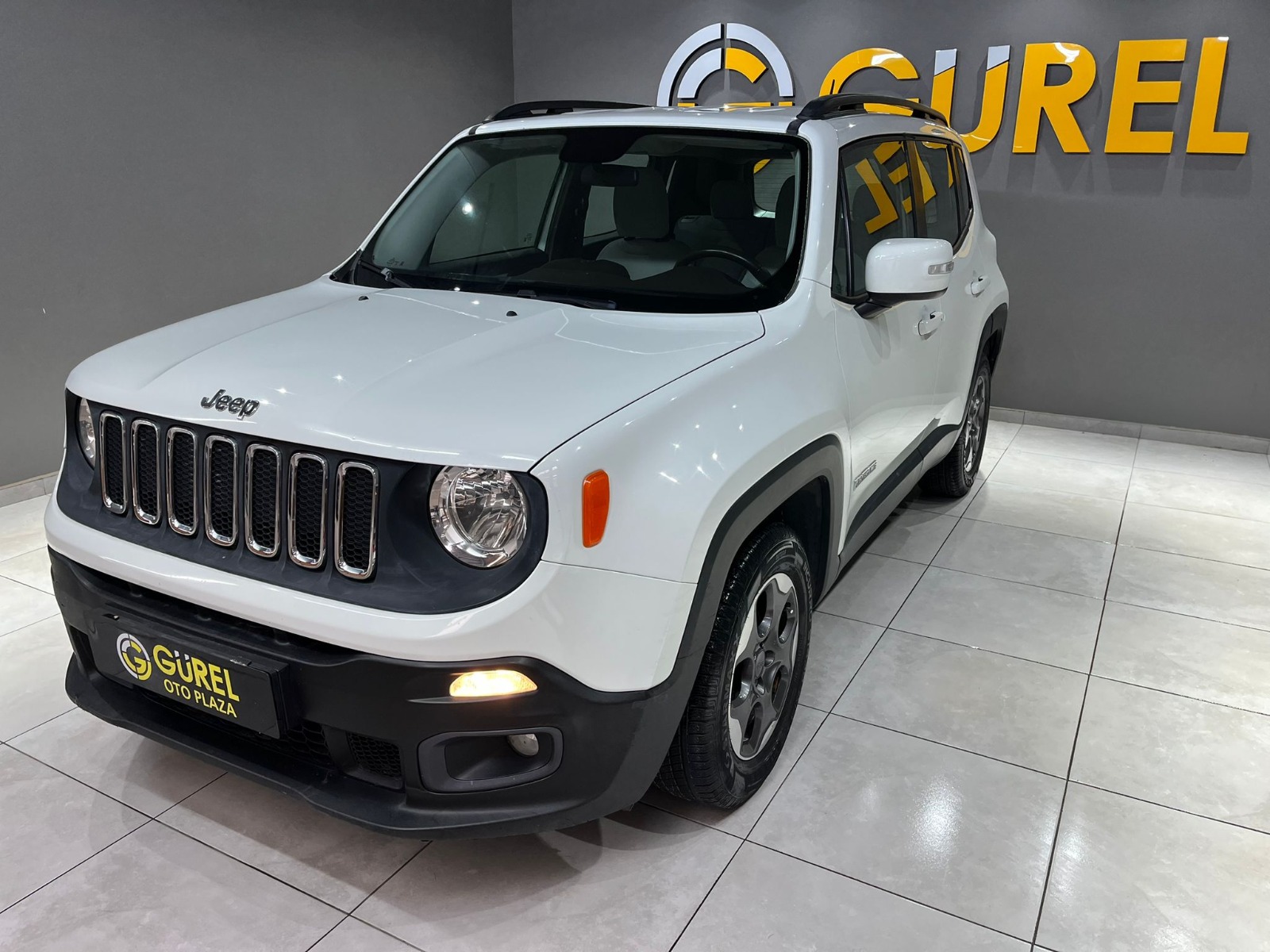 TaksitliOto.Net | 2.El Jeep Renegade SUV 1.6 L MultiJet 4x2 Longitude | Manuel & Dizel | Beyaz | İzmir.2el 2014 Dizel Manuel Jeep Renegade Beyaz Gürel Tasarım Aksesuar Otomotiv San. Tic. Ltd. Şti.