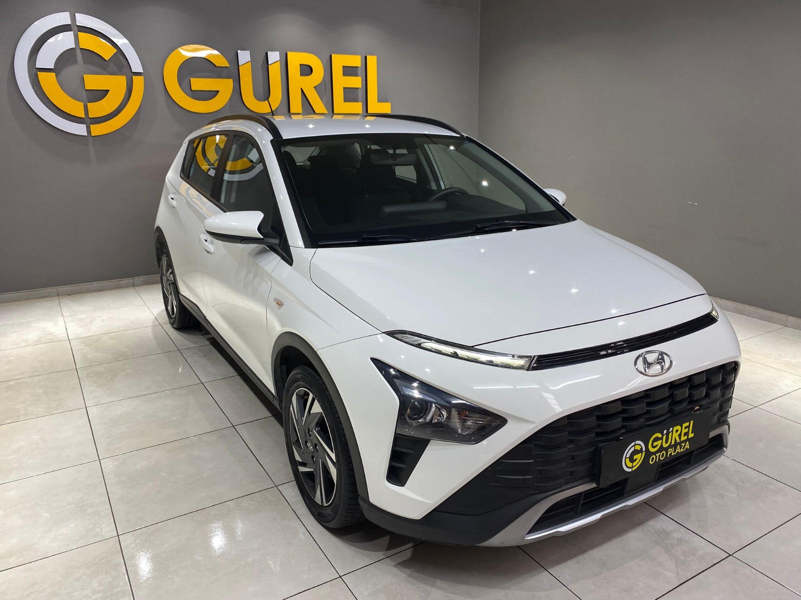 TaksitliOto.Net | 2.El Hyundai Bayon SUV 1.4 MPI Jump | Manuel & Benzin | Beyaz | İzmir.2el 2022 Benzin Manuel Hyundai Bayon Beyaz Gürel Tasarım Aksesuar Otomotiv San. Tic. Ltd. Şti.