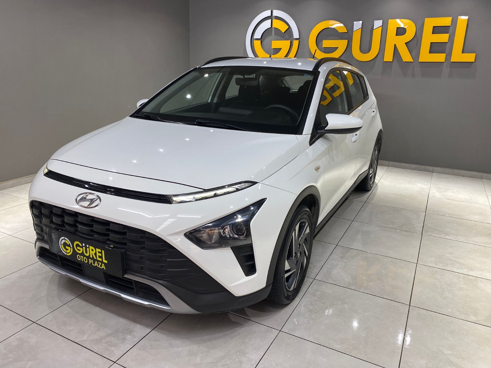 TaksitliOto.Net | 2.El Hyundai Bayon SUV 1.4 MPI Jump | Manuel & Benzin | Beyaz | İzmir.2el 2022 Benzin Manuel Hyundai Bayon Beyaz Gürel Tasarım Aksesuar Otomotiv San. Tic. Ltd. Şti.