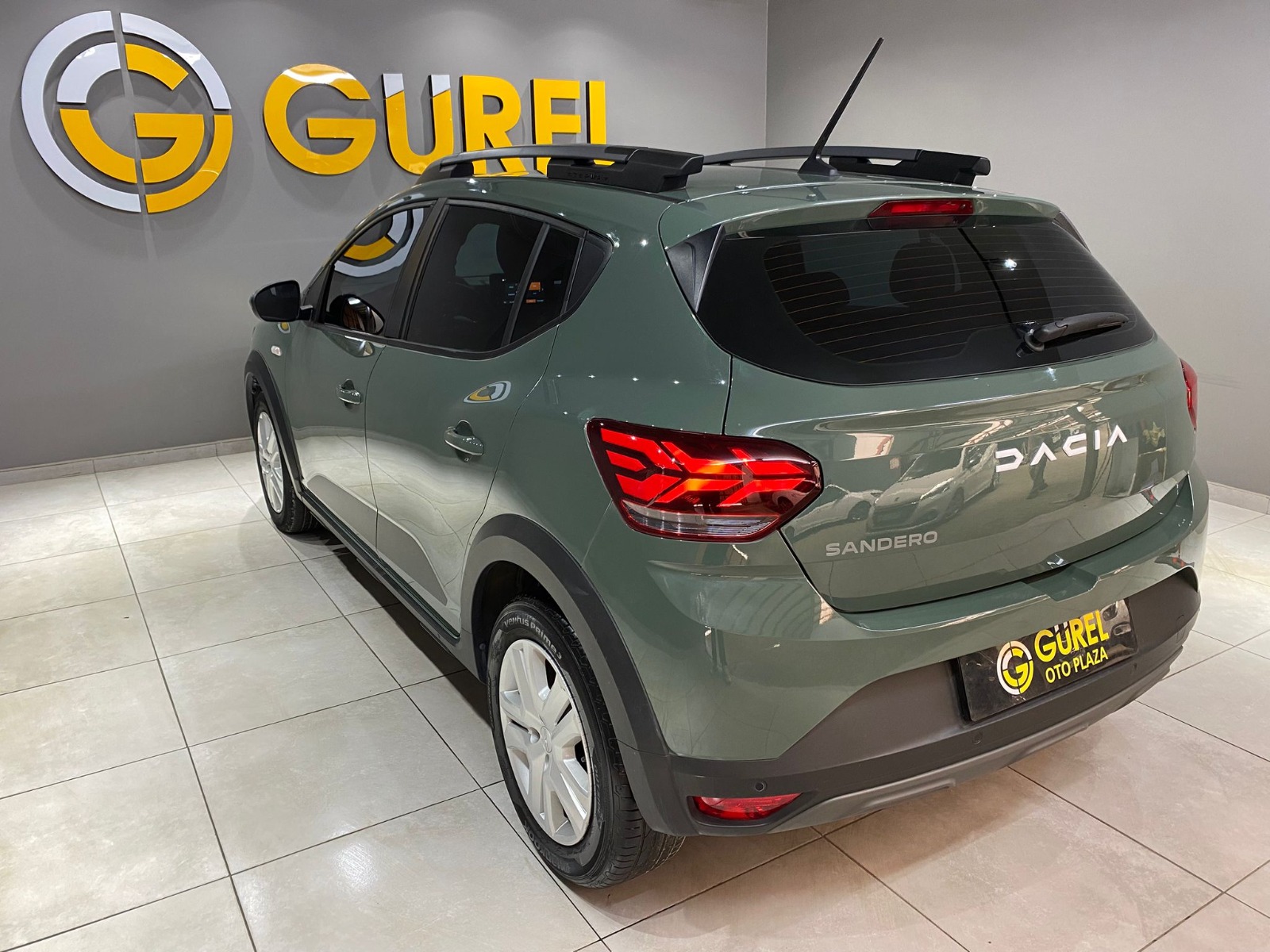 2023 Benzin Otomatik Dacia Sandero Yeşil Gürel Tasarım Aksesuar Otomotiv San. Tic. Ltd. Şti.