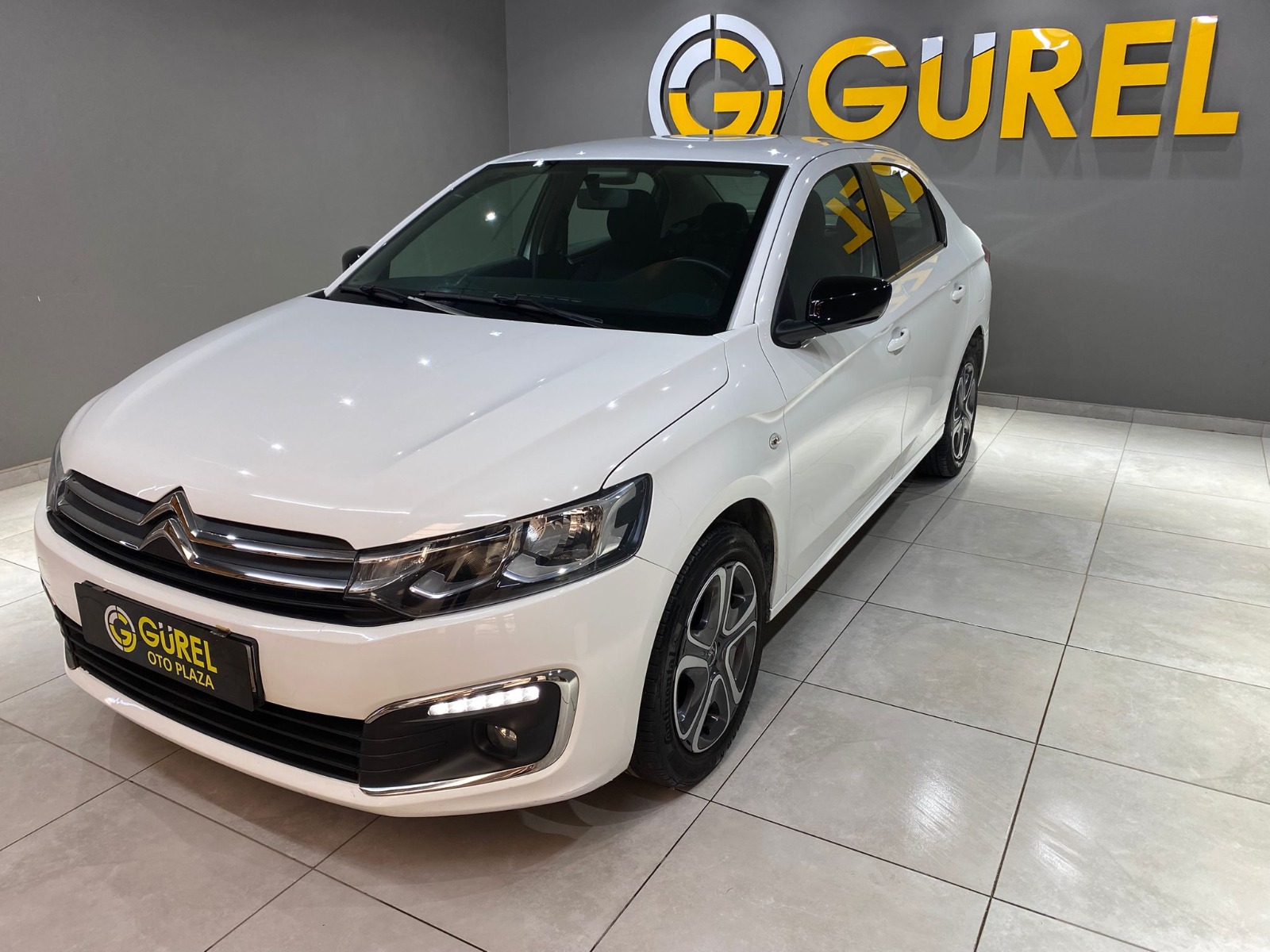 TaksitliOto.Net | 2.El Citroen C-Elysee Sedan 1.5 BlueHDI Feel | Manuel & Dizel | Beyaz | İzmir.2el 2022 Dizel Manuel Citroen C-Elysee Beyaz Gürel Tasarım Aksesuar Otomotiv San. Tic. Ltd. Şti.