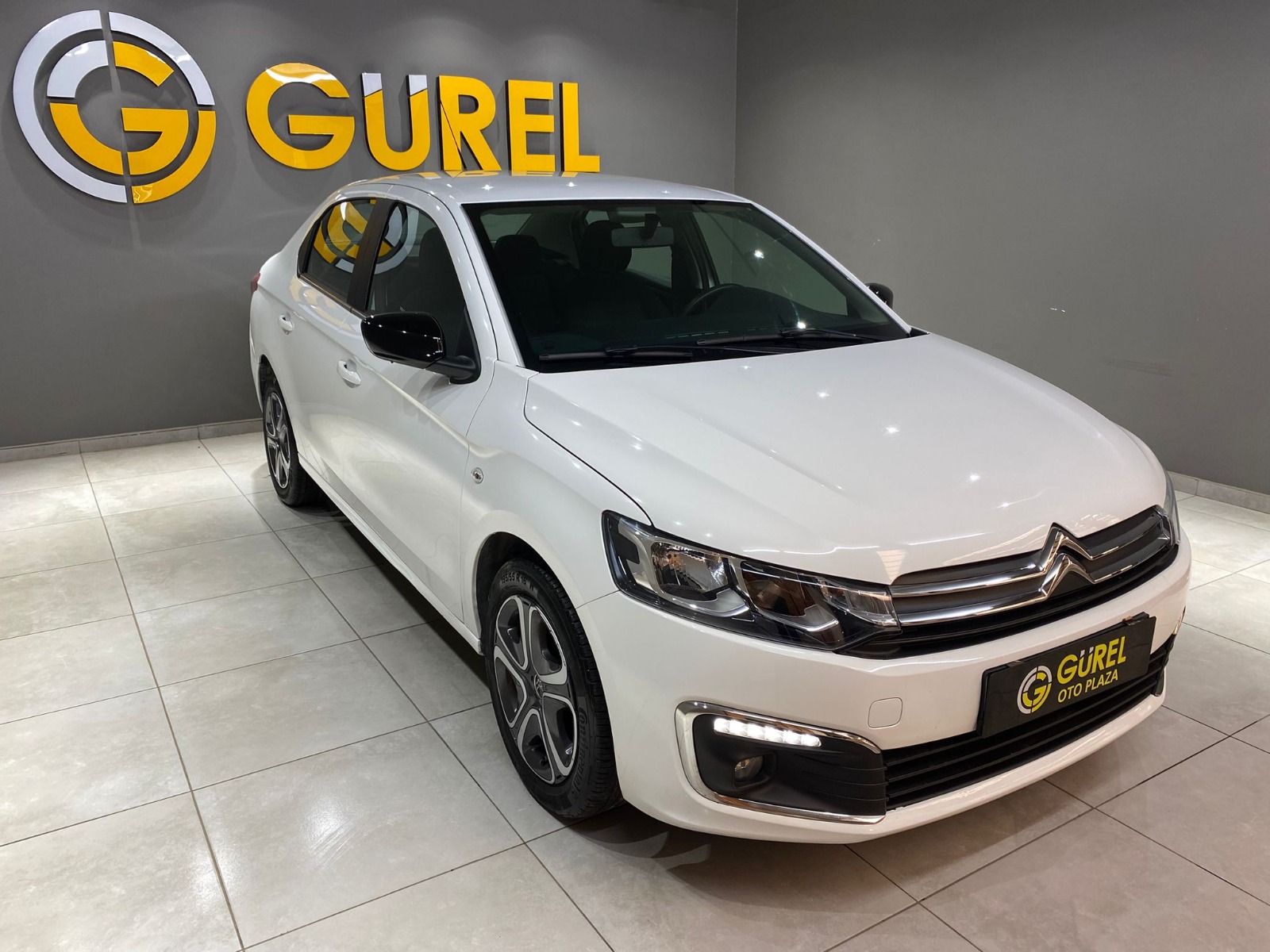 TaksitliOto.Net | 2.El Citroen C-Elysee Sedan 1.5 BlueHDI Feel | Manuel & Dizel | Beyaz | İzmir.2el 2022 Dizel Manuel Citroen C-Elysee Beyaz Gürel Tasarım Aksesuar Otomotiv San. Tic. Ltd. Şti.