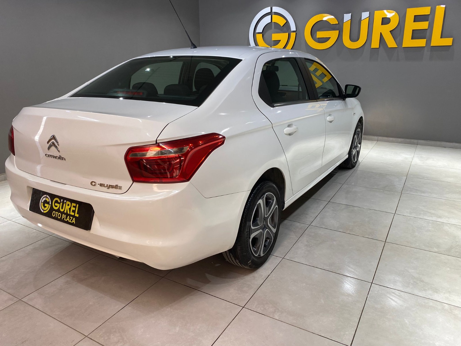 TaksitliOto.Net | 2.El Citroen C-Elysee Sedan 1.5 BlueHDI Feel | Manuel & Dizel | Beyaz | İzmir.2el 2022 Dizel Manuel Citroen C-Elysee Beyaz Gürel Tasarım Aksesuar Otomotiv San. Tic. Ltd. Şti.