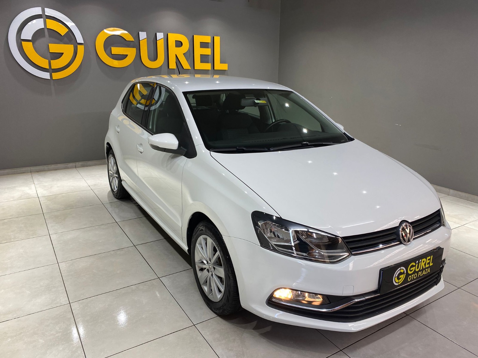 TaksitliOto.Net | 2.El Volkswagen Polo Hatchback 1.2 TSI BMT Comfortline DSG | Otomatik & Benzin | Beyaz | İzmir.2el 2016 Benzin Otomatik Volkswagen Polo Beyaz Gürel Tasarım Aksesuar Otomotiv San. Tic. Ltd. Şti.