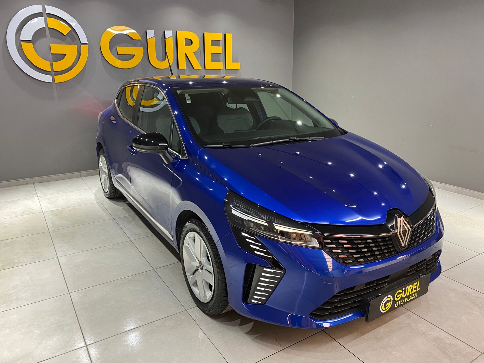 2024 Benzin Otomatik Renault Clio Mavi Gürel Tasarım Aksesuar Otomotiv San. Tic. Ltd. Şti.
