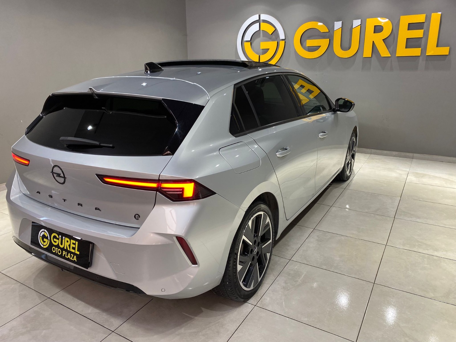 2024 Elektrik Otomatik Opel Astra-e Gümüş Gri Gürel Tasarım Aksesuar Otomotiv San. Tic. Ltd. Şti.