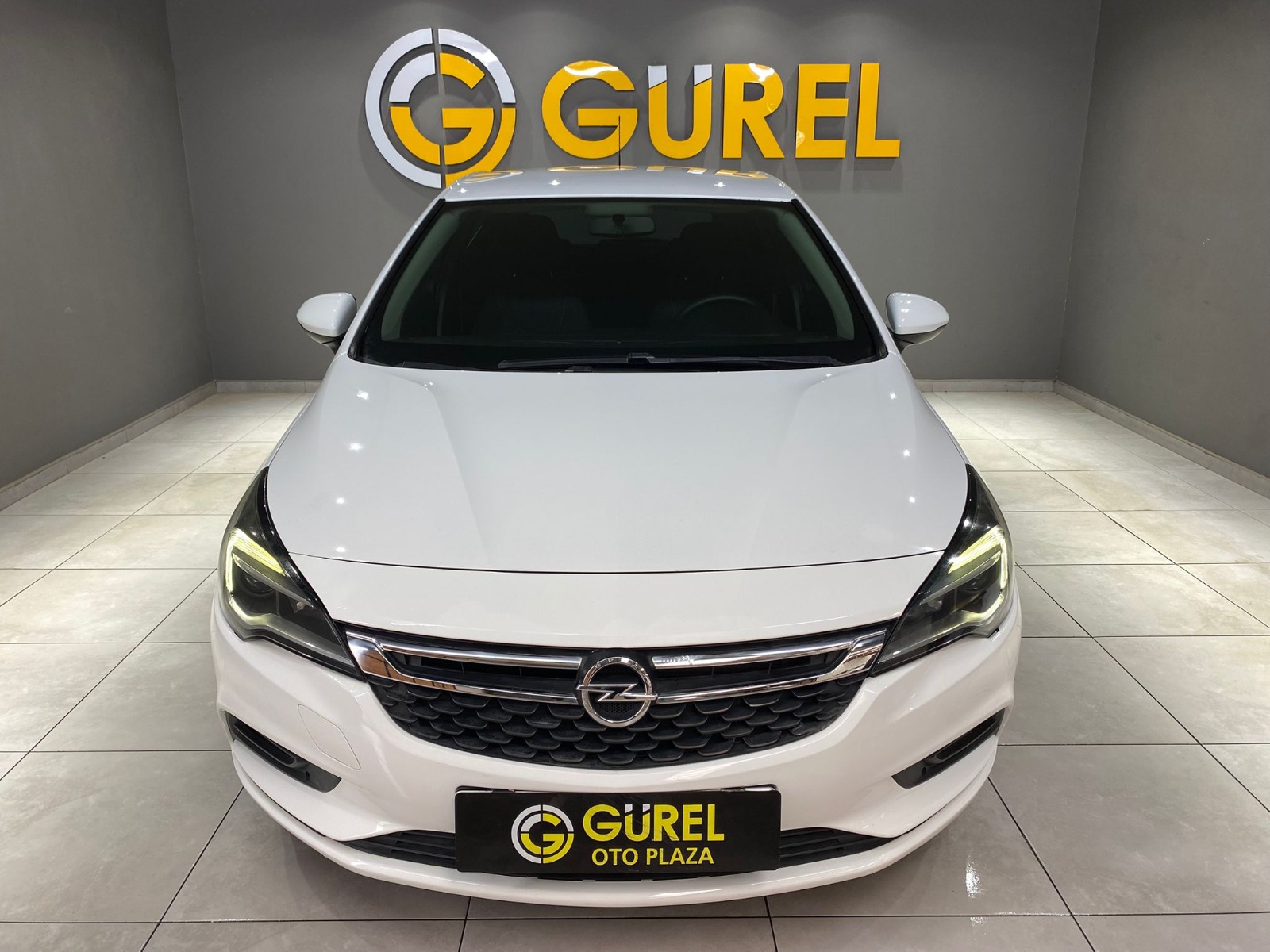 TaksitliOto.Net | 2.El Opel Astra Hatchback 1.4 Enjoy | Manuel & Benzin | Beyaz | İzmir.2el 2017 Benzin Manuel Opel Astra Beyaz Gürel Tasarım Aksesuar Otomotiv San. Tic. Ltd. Şti.