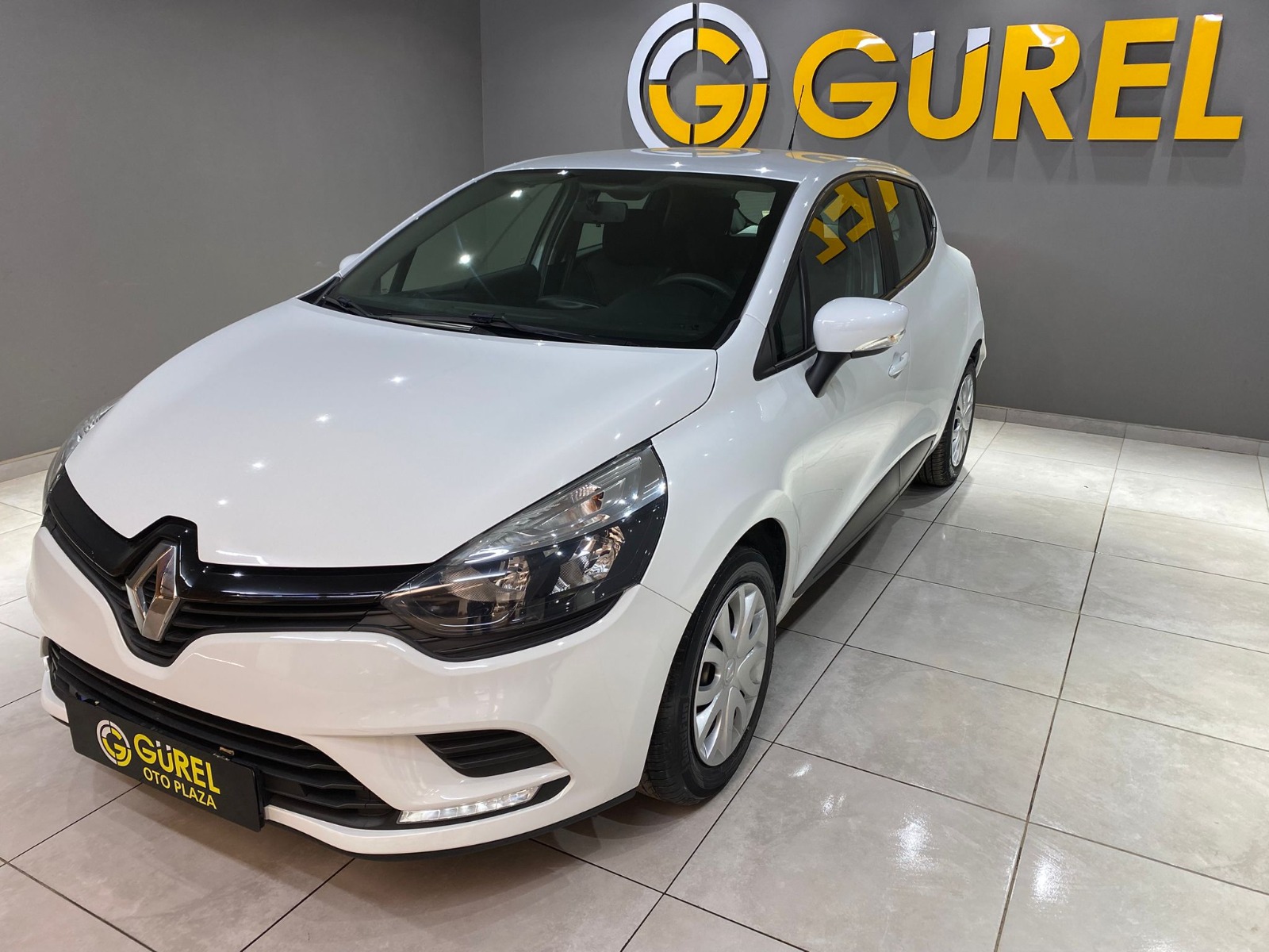 TaksitliOto.Net | 2.El Renault Clio Hatchback 0.9 TCe Joy | Manuel & Benzin | Beyaz | İzmir.2el 2020 Benzin Manuel Renault Clio Beyaz Gürel Tasarım Aksesuar Otomotiv San. Tic. Ltd. Şti.