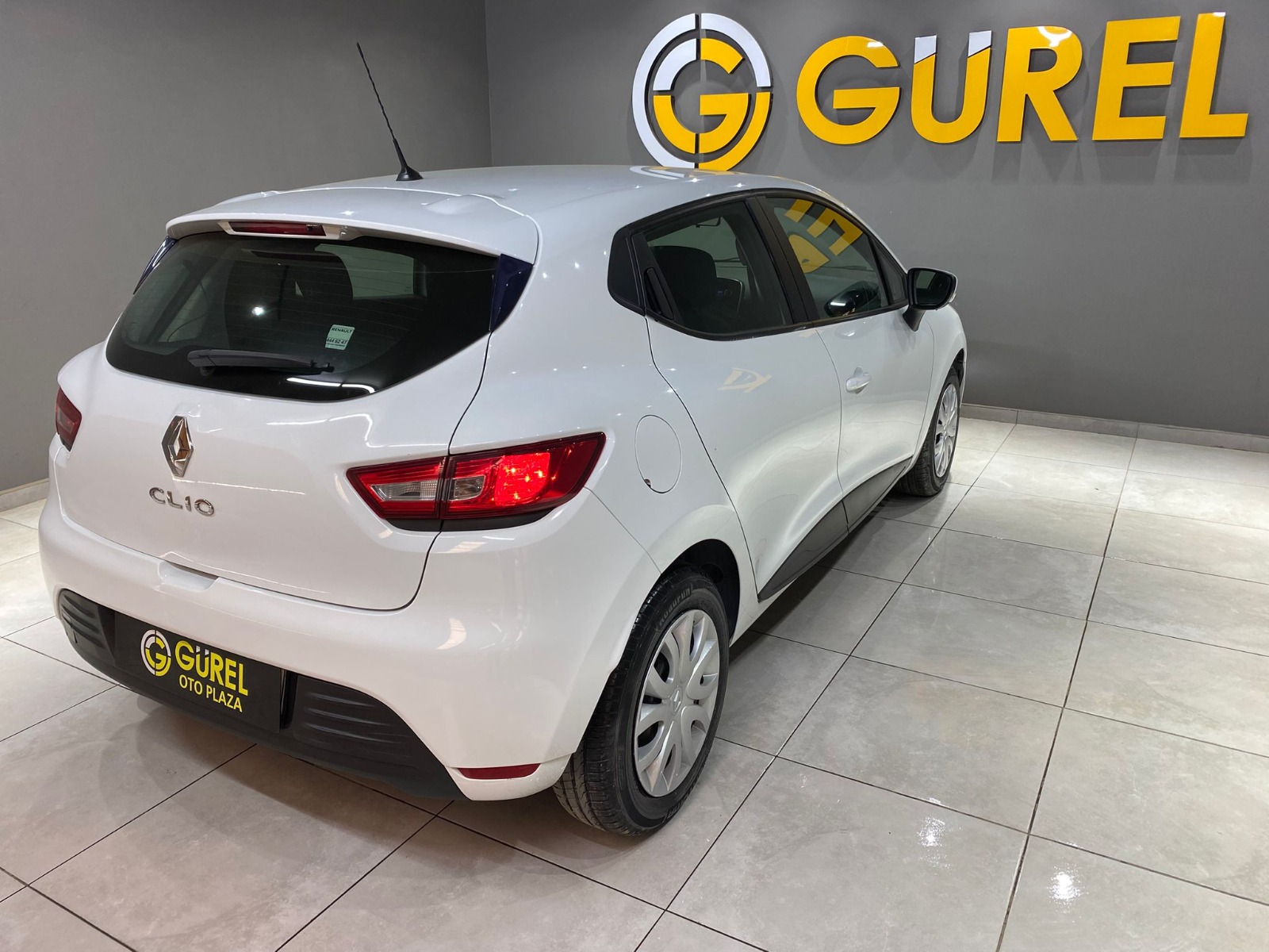 TaksitliOto.Net | 2.El Renault Clio Hatchback 0.9 TCe Joy | Manuel & Benzin | Beyaz | İzmir.2el 2020 Benzin Manuel Renault Clio Beyaz Gürel Tasarım Aksesuar Otomotiv San. Tic. Ltd. Şti.