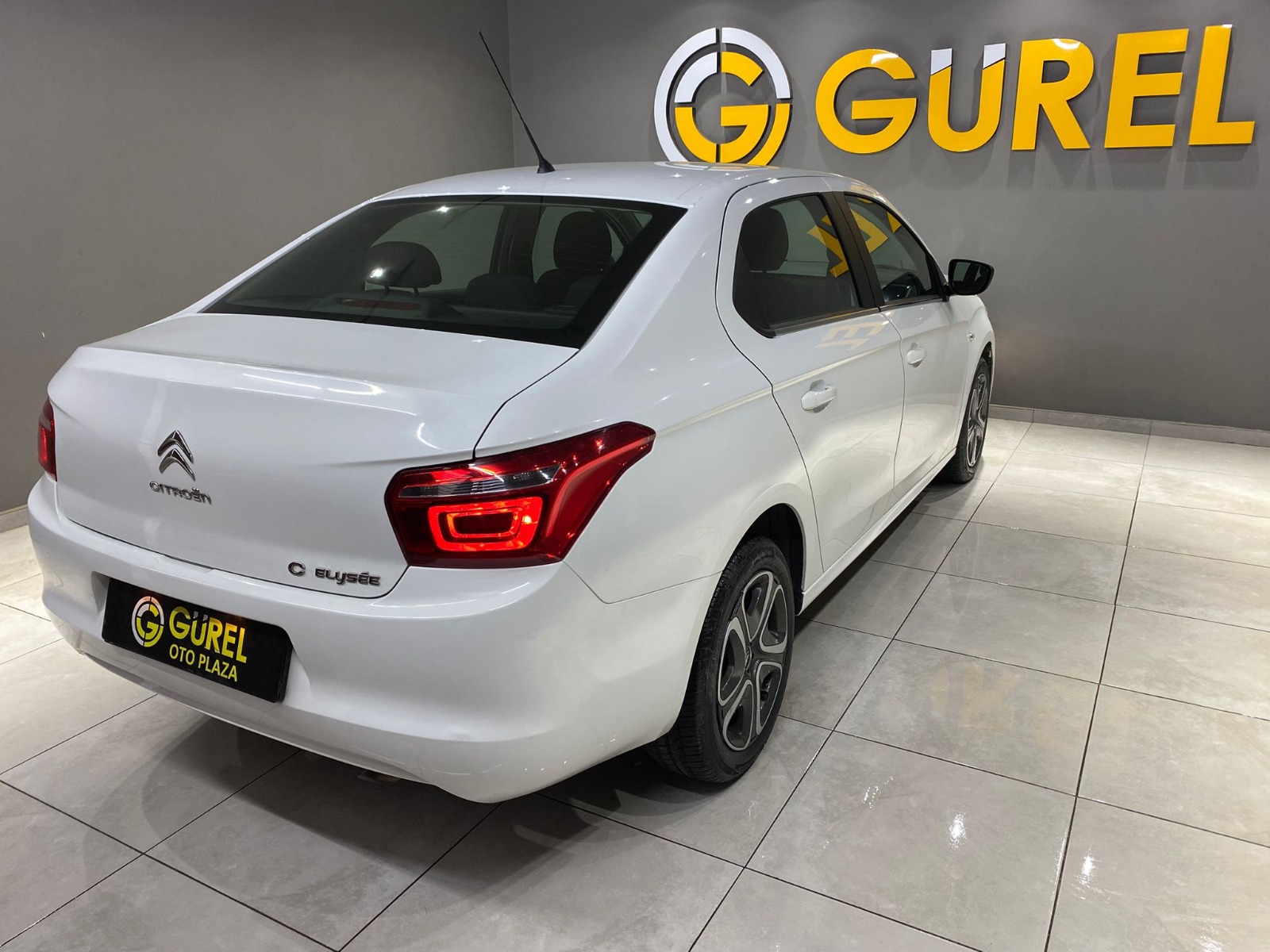 TaksitliOto.Net | 2.El Citroen C-Elysee Sedan 1.5 BlueHDI Feel | Manuel & Dizel | Beyaz | İzmir.2el 2023 Dizel Manuel Citroen C-Elysee Beyaz Gürel Tasarım Aksesuar Otomotiv San. Tic. Ltd. Şti.