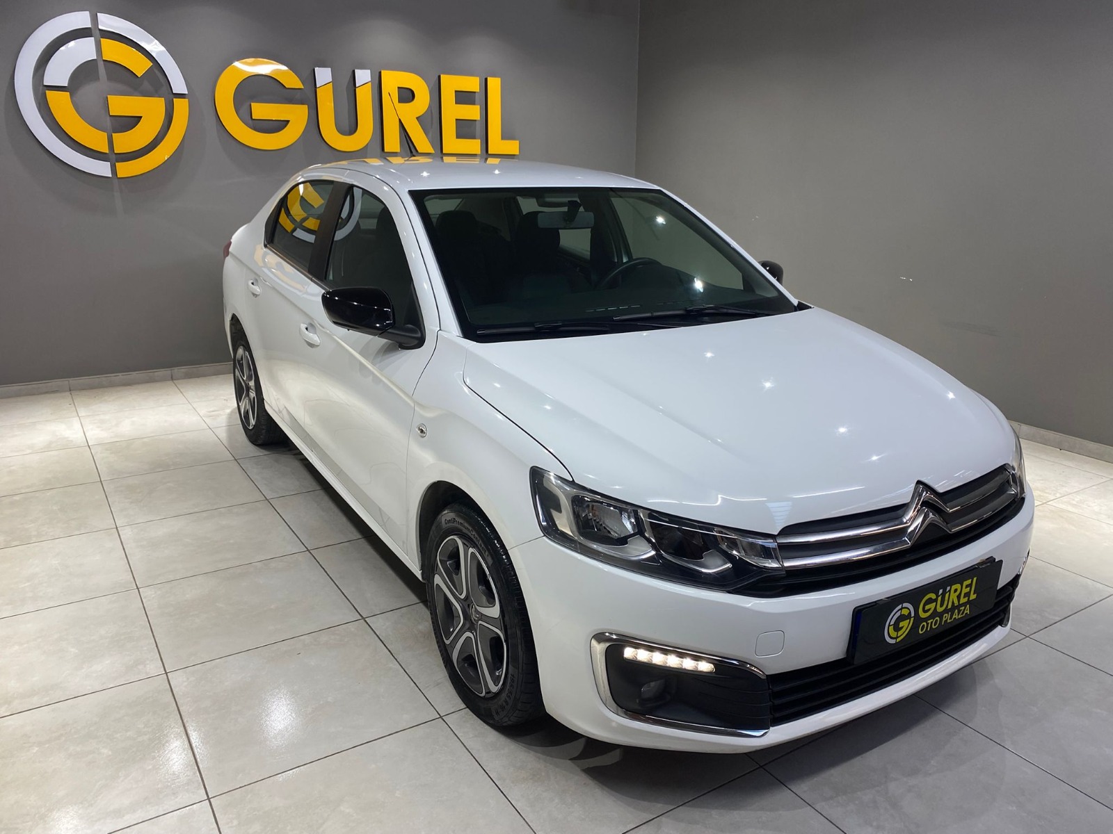 TaksitliOto.Net | 2.El Citroen C-Elysee Sedan 1.5 BlueHDI Feel | Manuel & Dizel | Beyaz | İzmir.2el 2023 Dizel Manuel Citroen C-Elysee Beyaz Gürel Tasarım Aksesuar Otomotiv San. Tic. Ltd. Şti.