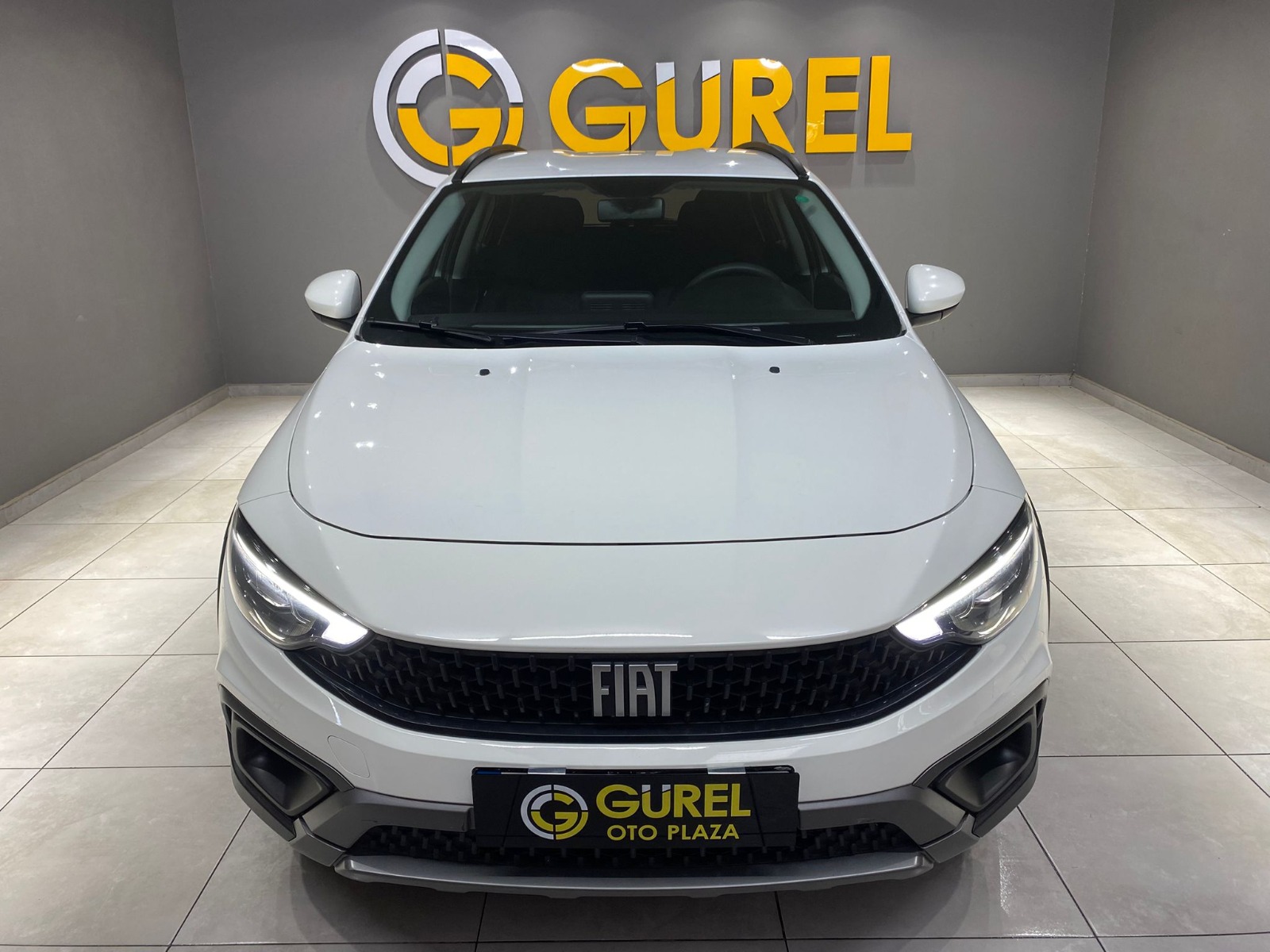 TaksitliOto.Net | 2.El Fiat Egea Cross 1.4 Fire Urban | Manuel & Benzin | Beyaz | İzmir.2el 2021 Benzin Manuel Fiat Egea Beyaz Gürel Tasarım Aksesuar Otomotiv San. Tic. Ltd. Şti.