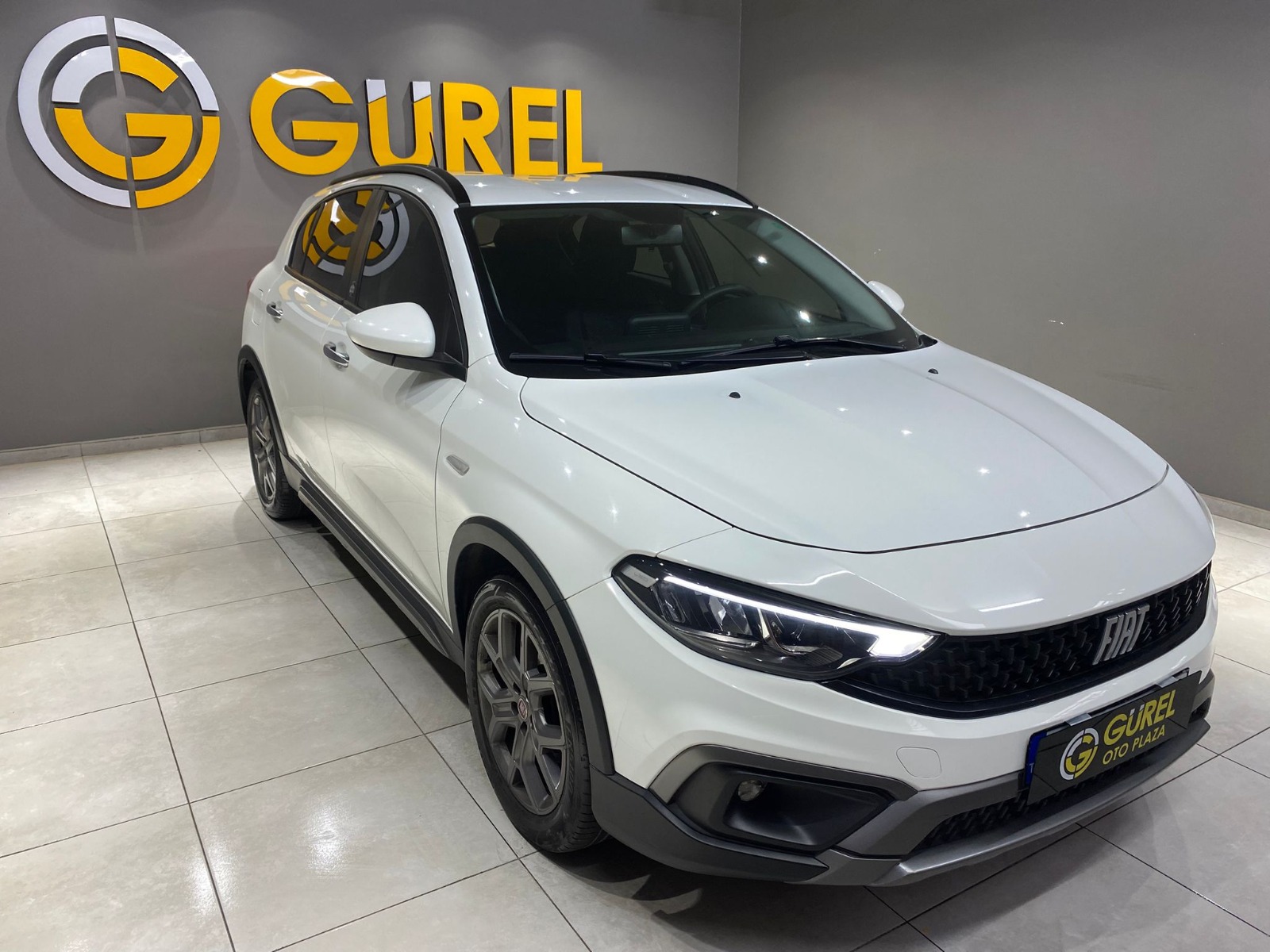 TaksitliOto.Net | 2.El Fiat Egea Cross 1.4 Fire Urban | Manuel & Benzin | Beyaz | İzmir.2el 2021 Benzin Manuel Fiat Egea Beyaz Gürel Tasarım Aksesuar Otomotiv San. Tic. Ltd. Şti.