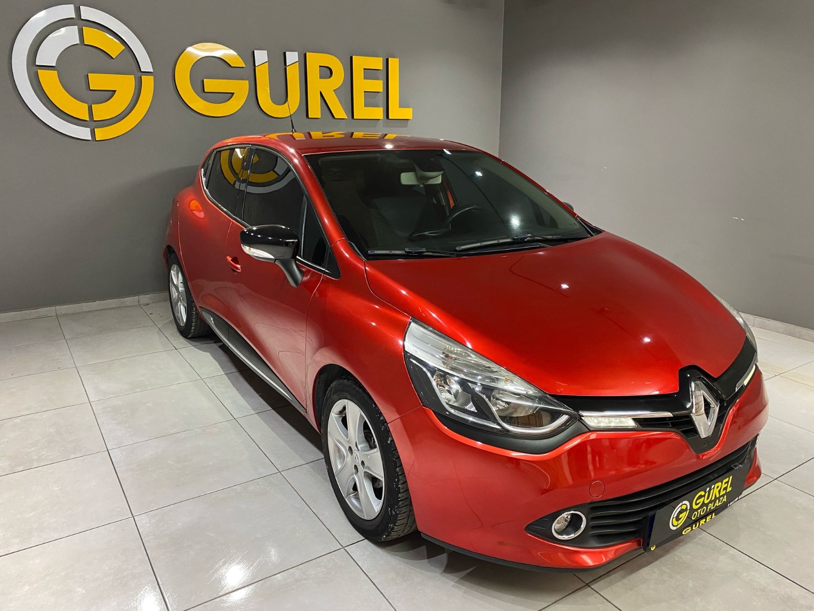 2015 Benzin + LPG Manuel Renault Clio Kırmızı Gürel Tasarım Aksesuar Otomotiv San. Tic. Ltd. Şti.